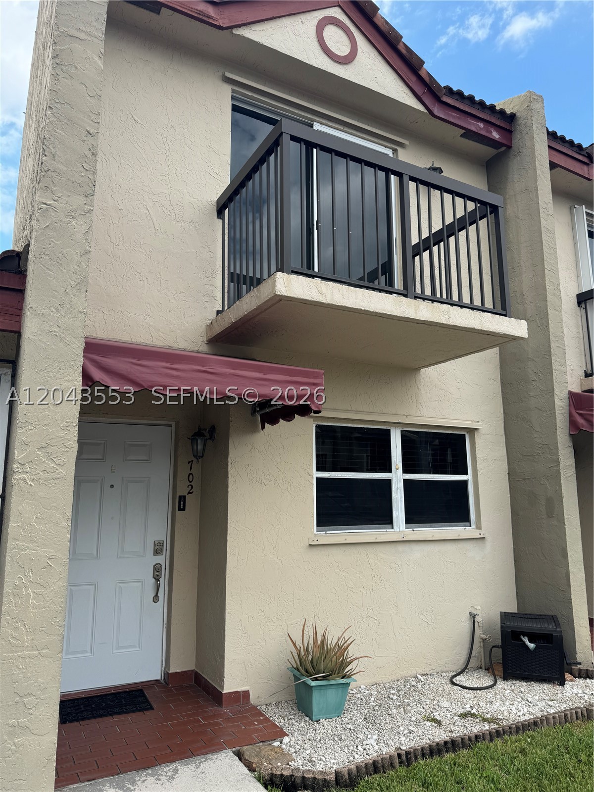 Beautiful Two story Townhouse with 2 bed upstairs and Each bedroom has private bathroom and 1/2 bathroom on the first floor with huge patio with Amazing Canal View from the patio. Recently Painted. Fenced patio. community pool. New laminated floors upstairs and downstairs  easy to show. the unit is Tenant Occupied.