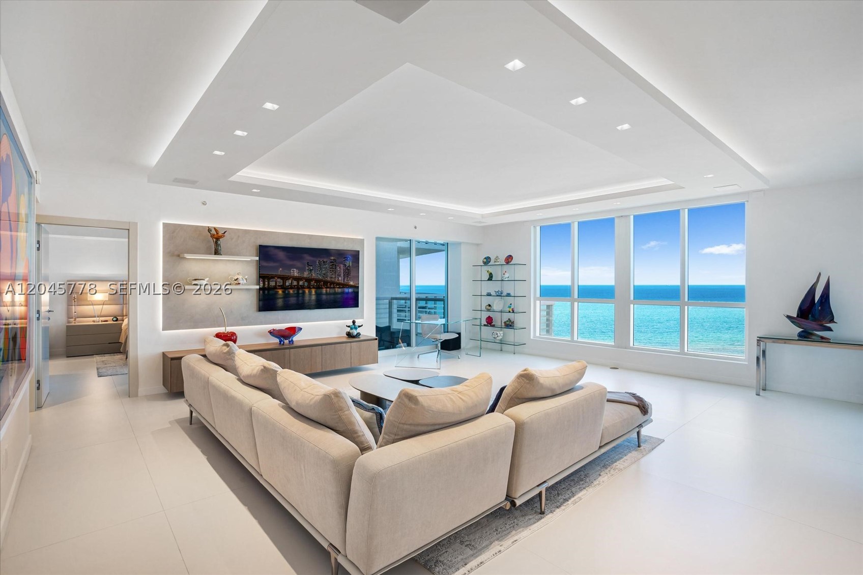 Once in a decade opportunity...two side by side units on the market. See listing for neighboring unit that could potentially be combined to create a 6 BR, 6+ BA unit of 4,256 sf (verify with engineer). 1503 is a rare flow through unit with four balconies defining this immaculate beachfront residence featuring direct Atlantic Ocean views and views of downtown Miami. One-year complete renovation recently completed makes unit 1503 one of the most elegant condos on the market. Arriving home through the private elevator foyer is only the first luxury you will experience in this spacious residence. Professionally designed by Project23 with a modern, Miami chic aesthetic, imported Italian cabinetry and Italian doors. Located in the heart of Miami Beach within the Faena District and near the new Aman Residences and Miami Beach Cipriani Residences currently under construction. Upgrades include: Architectural ceiling and cabinet lighting with LEDs, imported flooring, custom millwork throughout, enlarged closets, and brand-new A/C.