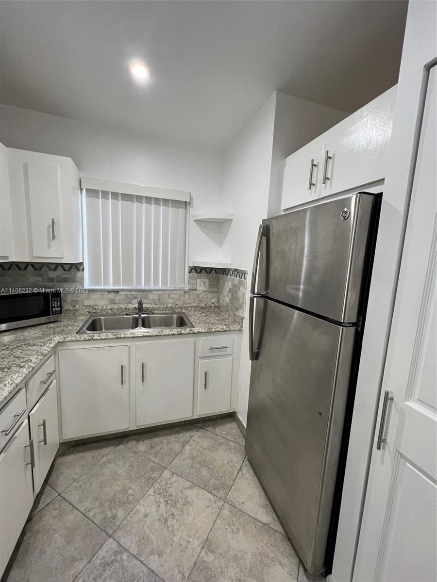 SUZANNE PLAZA CONDO - Residential Lease