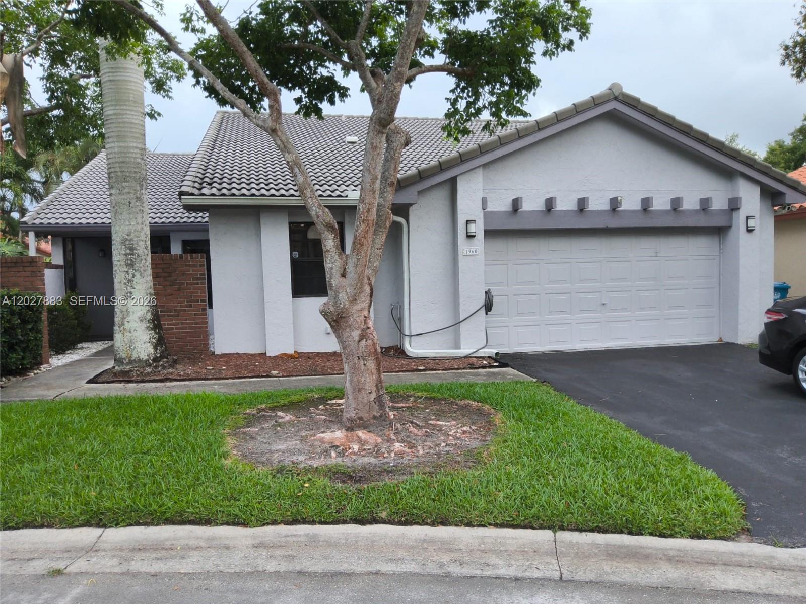 Bright, spacious, and move-in ready, this 3-bedroom, 2-bathroom home offers over 2,000 sq. ft. of open living space. You’ll love the unique character of the Saltillo tile floors, the high ceilings, and the private, gated front courtyard. Plus, it has a spotless 2-car garage with epoxy floors.  Easy to show—use ShowingTime to schedule today!
?Located in a quiet neighborhood with access to Weston’s famous A+ top-rated schools. Super clean, easy to show, and priced to sell. Come see it before it’s gone!