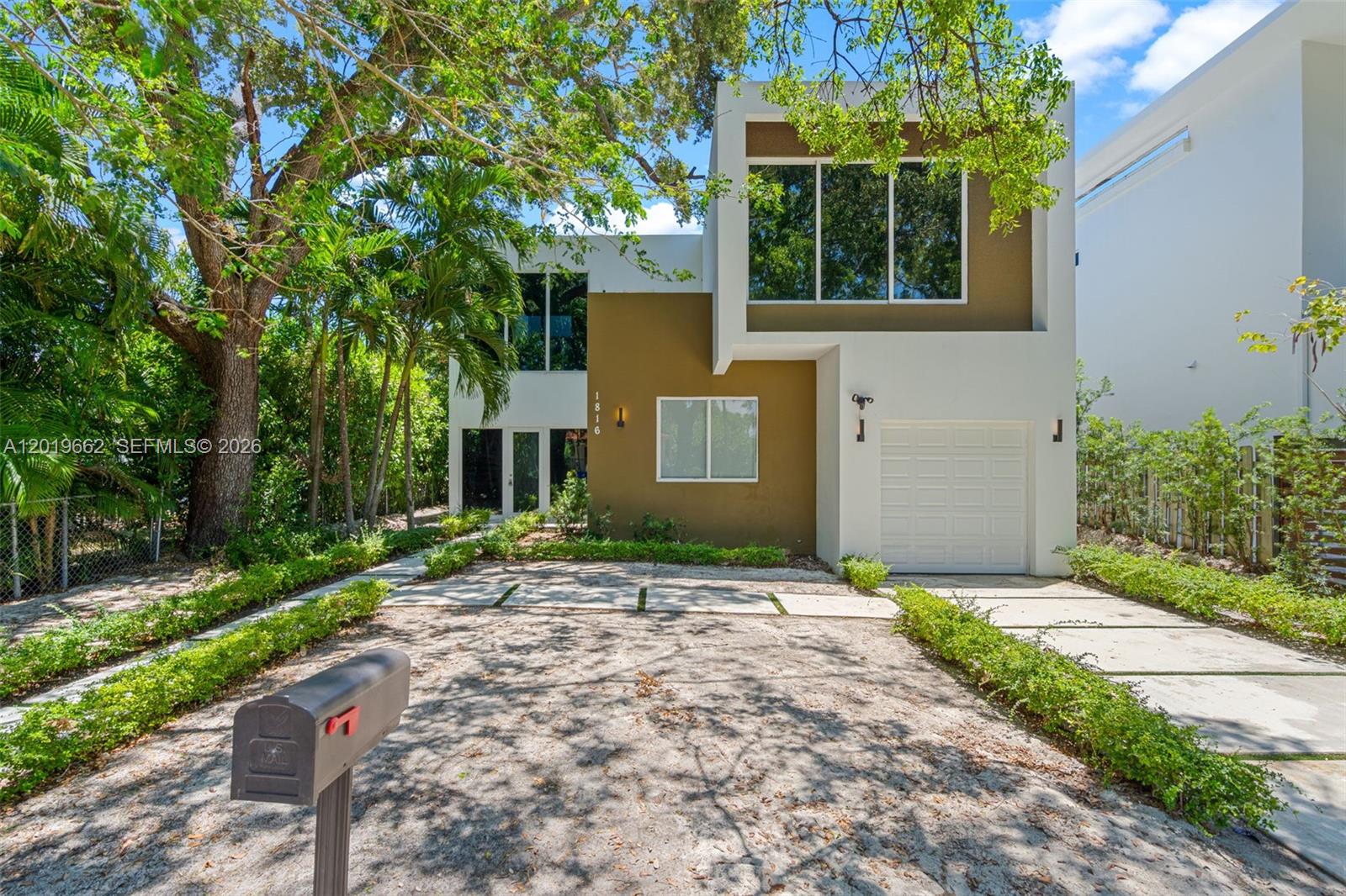 Highly sought-after Shenandoah! Spacious 5-bedroom, 5-bath home built in 2022 featuring a 1-car garage, pool, jacuzzi, and built-in barbecue, perfect for entertaining. Dramatic high ceilings and an open-concept layout create an airy feel throughout the first floor. Desirable floor plan includes a large first-floor suite, ideal for guests or multigenerational living, in addition to an oversized master suite upstairs, offering the convenience of dual primary bedrooms. Prime central location just minutes from Brickell, Coral Gables, Downtown Miami, major highways, dining, and shopping. Images in this listing have been virtually staged.