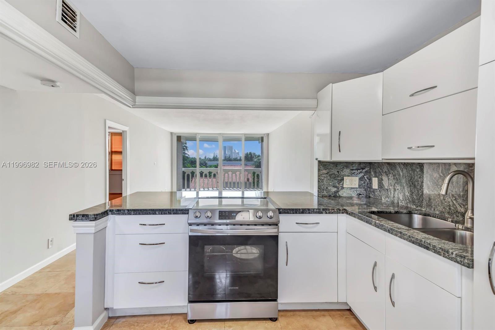 Beachside condo just steps from the ocean. Low maintenance fees ($477) + $141 (every 3 month towards reserve)  Hurricane-impact windows and sliding balcony doors. Fully updated and move-in ready. Features a renovated kitchen with white cabinets,  stainless steel appliances and marble counter top Spacious layout with large primary bedroom, walk-in closet, 1.5 bathrooms, and private balcony with garden views. Bright unit with travertine floor throughout main area and bamboo wooden floors in the bedroom. Well managed building with no current assessments and completed 40 and 50 year inspections. Building has reserves!!! Amenities include pool, gym, BBQ area, and laundry facilities, private storage.   Prime location across from the beach near Aventura Mall, Gulfstream Park, Casinos, Fort Lauderdale Airport, and shopping. No Lease first  3 years of ownership. After that yearly rental. No Pets. 1 assigned parking space