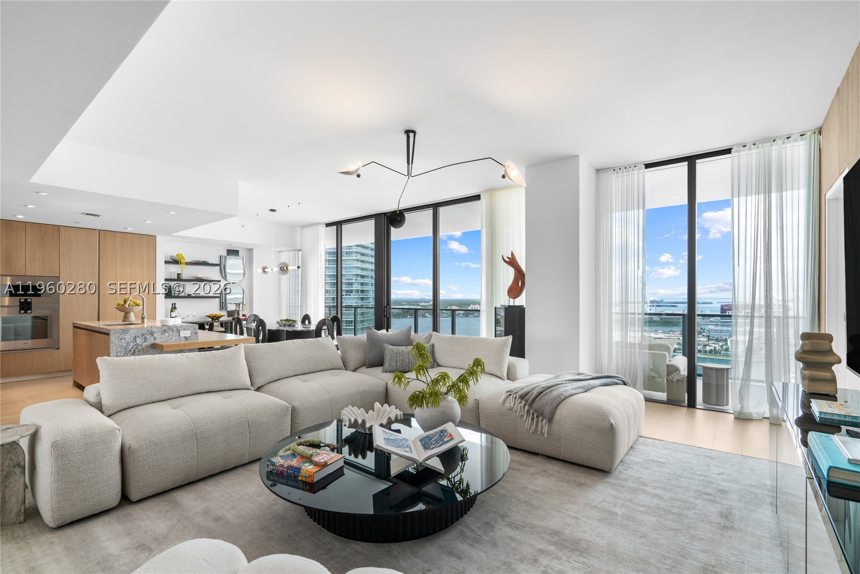 Never-lived-in, spacious 3 bedroom, 4 bathroom residence with 10 ft ceilings at Five Park - the newest luxury residential tower in Miami Beach. 2,335 sq ft of interior space, complemented by oversized balconies. Beautiful sunset views. Large walk in closet in primary bedroom, white oak Italian kitchen with quartzite countertops and Gaggenau appliances, marble primary bathroom with tub and separate shower, laundry room. Five Park is a full service luxury building, offering its residents all amenities including private beach club via house car, 2 pools, gym, spa, on-site restaurant and more. Most sought-after location in Miami due to proximity to restaurants, beach, parks, gyms etc. New building, opened in November 2024.