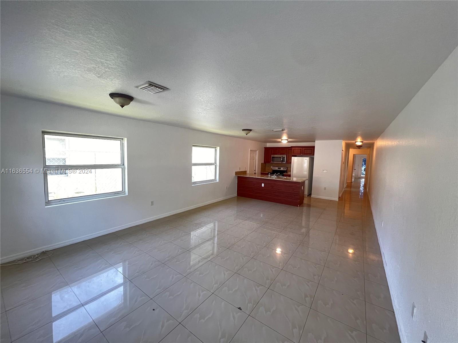 WELCOME HOME—This spacious 3-bedroom, 2-bath unit is in great condition and is close to I95, downtown Wynwood, and Brickell