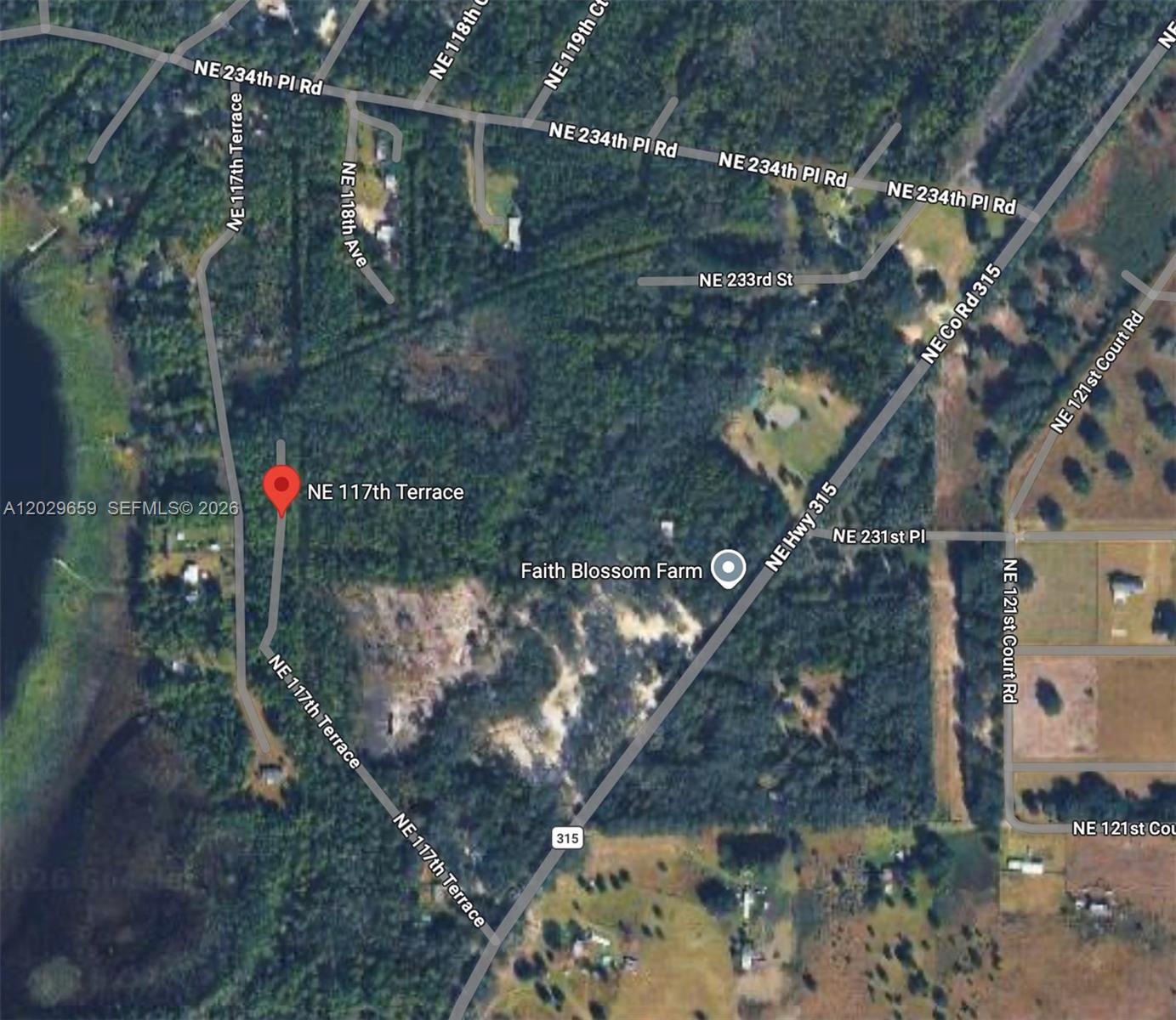 Build your dream on this versatile 0.27-acre lot in peaceful Fort McCoy. This perfectly rectangular 75' x 154' parcel features R-4 zoning, which offers maximum flexibility by welcoming site-built, modular, and mobile homes. Enjoy total freedom with no HOA, no monthly fees, and no architectural review boards to limit your vision. Located just 3 minutes from the scenic Deer Back Lake and 15 minutes from the Ocala National Forest, this property is an ideal retreat for those who love an outdoor lifestyle. With easy access via a public road on NE 117th Terrace and low annual taxes of only $92, this is a prime, hassle-free investment opportunity. The property is being sold as-is with a straightforward 14–21 day closing timeline. Buyer is responsible for independent verification of all zoning, utility, and building requirements with Marion County. Secure your future in this growing area today!