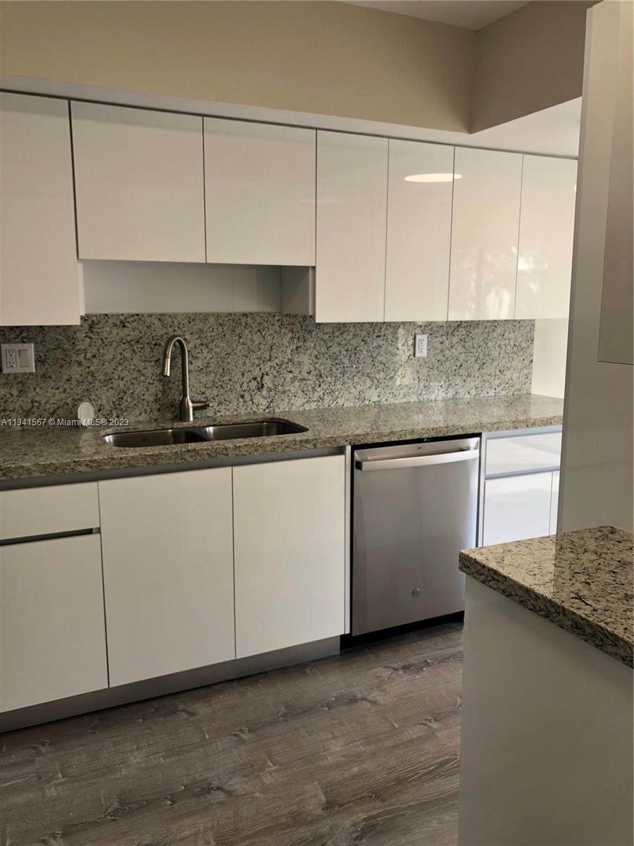 MILLER GARDENS CONDO - Residential Lease