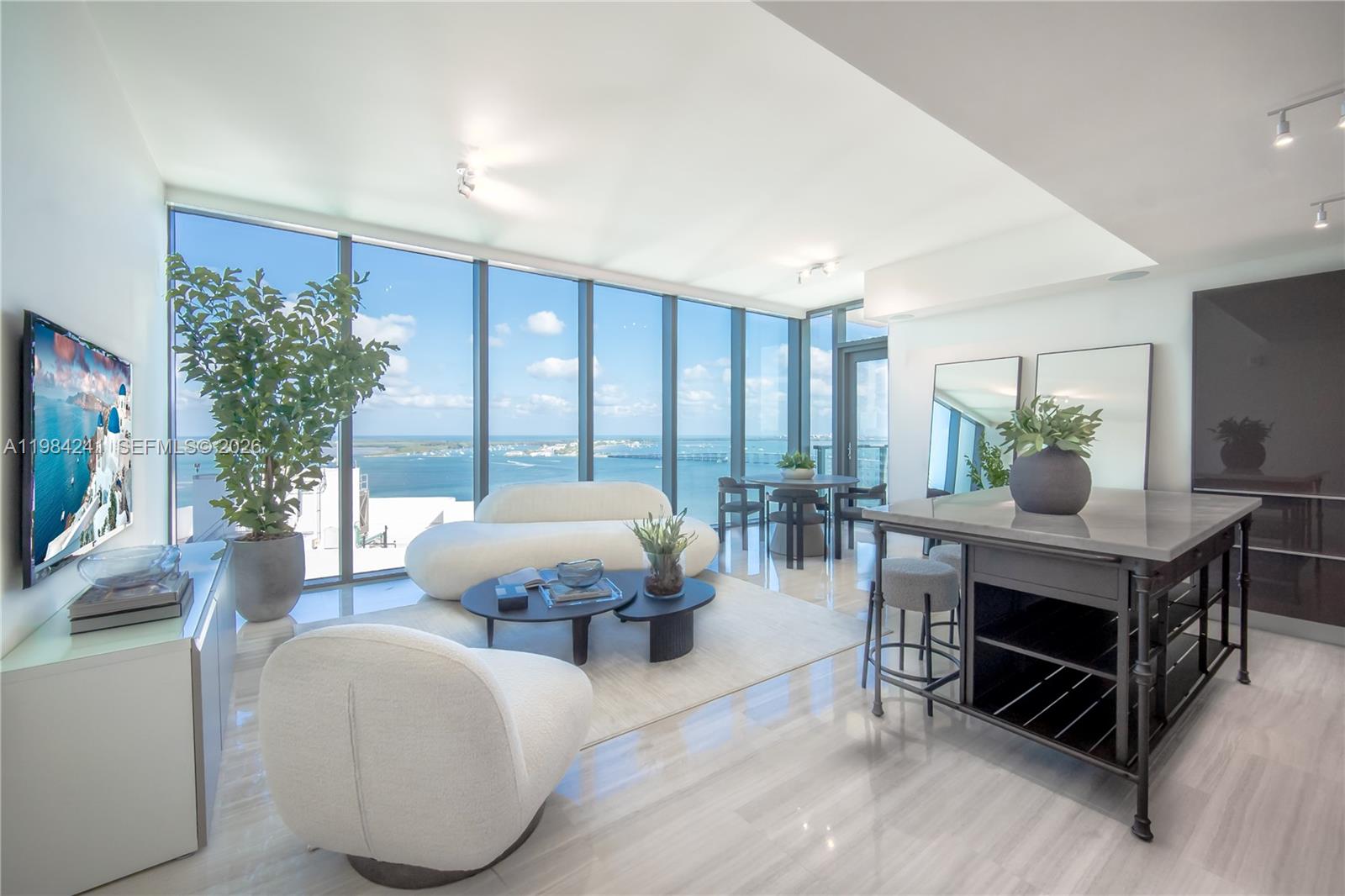 Live above it all at Echo Brickell. This 2-bedroom, 2.5-bath southeast corner residence offers unobstructed panoramic views and smart iHome integration for audio, lighting, and climate control. Features include marble floors, Italian cabinetry, automatic shades, reverse osmosis water filtration, and upgraded fiber optic internet. Enjoy two terraces, one with BBQ and refrigerator. Echo Brickell sets the standard for high-end living with amenities including an infinity-edge pool, staffed bar, gym, jacuzzi, and EV charging available. Privacy and security are paramount, with 24/7 valet (2 spaces), concierge, and security ensuring a discreet, seamless lifestyle. Echo Brickell is the premier address in the heart of Brickell, offering an unparalleled blend of service, sophistication, and privacy. Unit is currently unfurnished. Photos from staging contract.