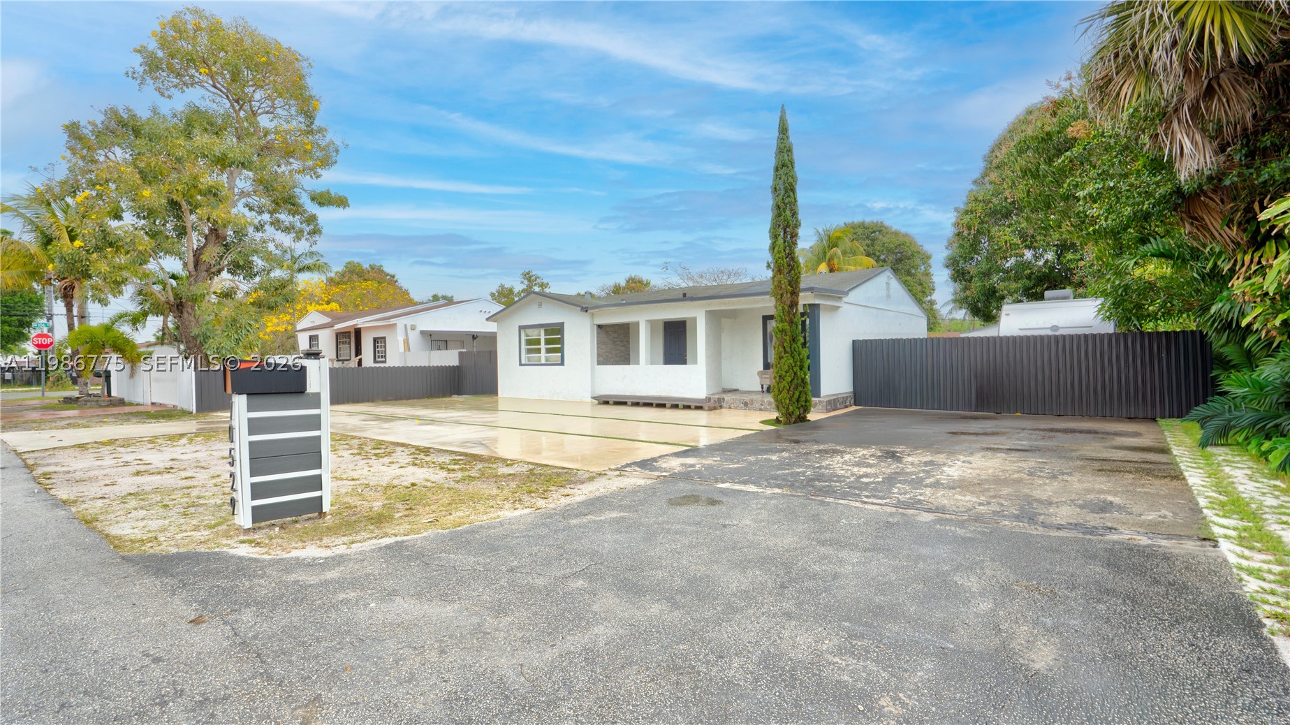 Home Sweet Home—come visit today! Great vibes and the kind of energy that makes you feel right at home. This is a great opportunity to own a Conveniently located just one block from NW 103rd St / W 49th St, this property sits in a fast-growing Miami neighborhood next to Miami Dade College North Campus, and just Just 8 blocks from the famous and lively city of Hialeah. This home features a comfortable 4-bedroom, 2-bath main house, along with a detached 1-bedroom, 1-bath guest home, with no homeowners association. The large fenced lot offers plenty of space, with flexible dual side-entry access and gated doors, plus room to park your RV, boat, commercial vehicle, or other recreational or income-producing vehicles, along with parking for approximately 8–12 cars. The property has great bones, a comfortable layout, and modern upgrades. Enjoy the new concrete driveway, new A/C, a mango tree, and your morning coffee on the porch. Make this house your home by adding your personal touch, whether it’s a future pool, space for your boat, or room for your next adventures. The neighborhood is peaceful, with Little River Park nearby for daily activities and Amelia Earhart Park for more adventurous weekends.OMG!! 49th St is just one block away, giving you quick access to shopping, dining, and entertainment. You’re only a 7-minute bike ride to Miami Dade College North Campus. There’s so much to do nearby, and you’re only a short drive from the ultimate Florida destination—South Beach, Miami.