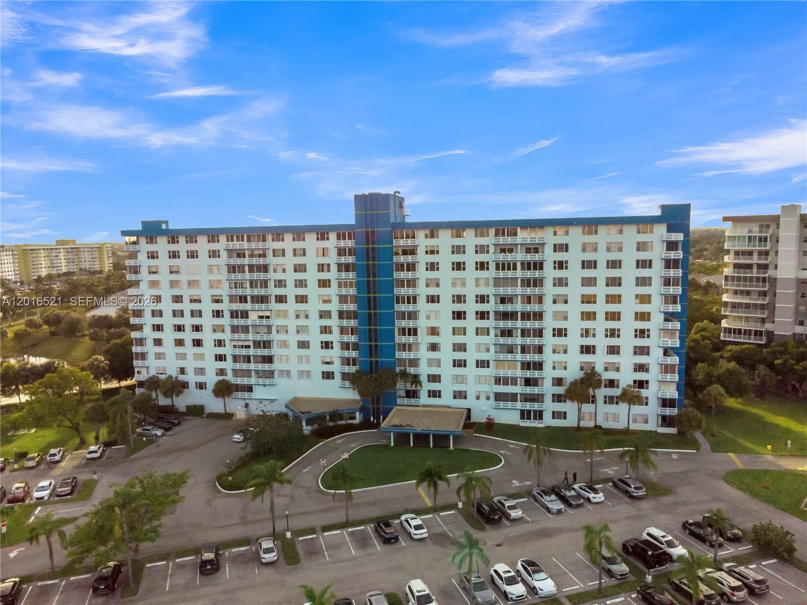 Spacious, bright, and perfectly located! This 1,132 SF condo in the heart of Hollywood offers a rare combination of size and convenience. Located in a sought-after 55+ community, unit 812 features a generous open floor plan, a custom built-in bar, and two oversized bedrooms. Enjoy morning coffee on your private, oversized balcony with serene views. Building amenities offer a vibrant, active lifestyle just minutes from world-class dining, Gulfstream Park, and the beach. Move-in ready or bring your designer touch to build instant equity in a prime Florida location.