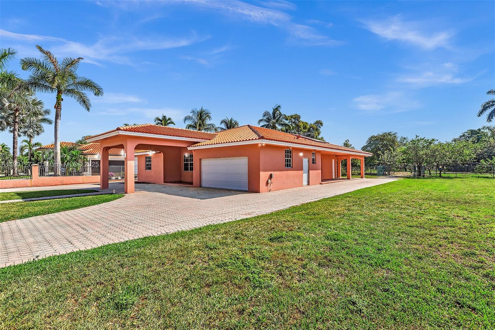 Back on the market! Built in 2001, this elegant Mediterranean-style home sits on nearly 1 ACRE lot in Miami’s desirable Belen area. Lush tropical grounds with guava, avocado & orange trees offer ample space to add more—or park your boat, RV, and toys. The 4 Bedrooms/4 Bathrooms layout features formal living & dining rooms, a spacious kitchen, and a large family room opening to an expansive terrace—perfect for entertaining. A two-car garage adds convenience. With its solid construction and oversized lot, this property offers exceptional potential for expansion. Prime location off SW 8th St near highways, Miami Airport, A+ schools, FIU, malls & shopping plazas. NO HOA.