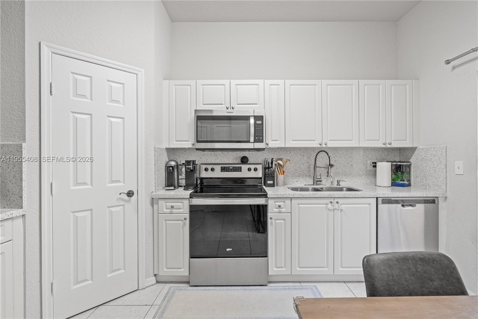 Remodeled 2BD 2.5BA condo in the highly desirable Arbor Park community within Keys Gate Golf and Tennis Country Club, offering easy low maintenance living in a gated, friendly neighborhood with lush green views.

Updated kitchen with quartz countertops, 2 year old appliances, and a spacious pantry. Tile throughout home, recessed lighting, and abundant natural light. Primary suite features dual sinks, a stand alone tub and shower, and custom closet built ins. Second bedroom is a junior suite with its own bathroom and a private balcony overlooking the garden.

Includes 1 car garage plus 2 driveway spaces, separate laundry room, private fenced patio, covered front porch, and AC coils approximately 1 year old.

Located directly in front of the community pool and playground just a one minute walk, making it ideal for families and everyday convenience.

HOA is $690 per month and includes roof coverage, exterior insurance plus cable and internet, which are usually separate monthly bills. It also includes 24 hour gated security, a resort style pool, playground, tennis courts, and full common area maintenance.

Minutes from A rated public and charter schools, BJ’s, Target, Homestead Baptist Hospital, and just 30 minutes from the Florida Keys.

FHA and Conventional welcome buy with as little as 3% down. Buyer may qualify for down payment assistance up to $14,550.