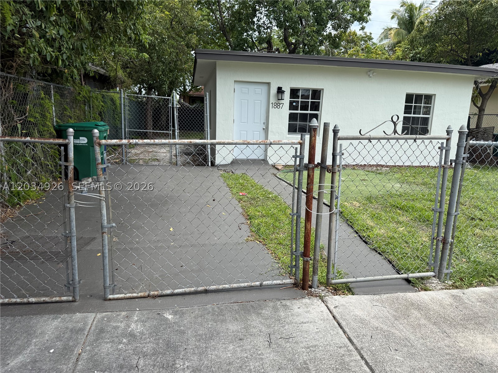 2-bedroom, 1-bathroom single-family home on a spacious 3,600 sq ft lot in an established Miami neighborhood. Recently updated with new plumbing, electrical wiring, water heater, ceiling fans,new bathroom vanity and interior doors. Freshly painted interior and exterior with tile flooring throughout. The backyard is one of the highlights — plenty of room for kids, pets, or entertaining, with mature mango and avocado trees and a screened fence for privacy. Located near Liberty City Elementary, local parks, and just minutes from major roadways connecting to downtown Miami and the beaches. Seller will offer credit for AC unit.