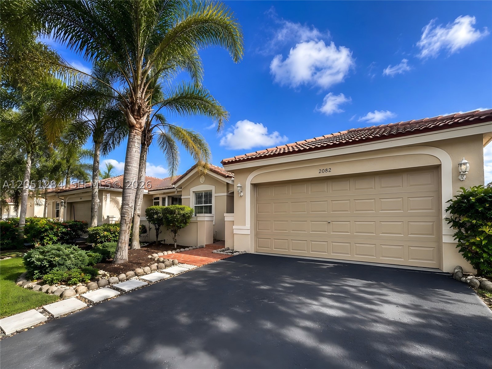 Pamper yourself in this sought-after neighborhood in Weston. This lovely one-story home features 3 bedrooms and 2 full bathrooms, open floor plan with vaulted ceiling and is located in a gated community with a resort-style clubhouse, professional management team and low HOA fees. Enjoy the convenience of being within walking distance of Gator Run elementary School and Gator Run Park. This property is perfect as a primary residence or an investment opportunity with the ability to rent immediately after closing. Home in this community rarely become available for sale, making this an unique opportunity that you dont want to miss.