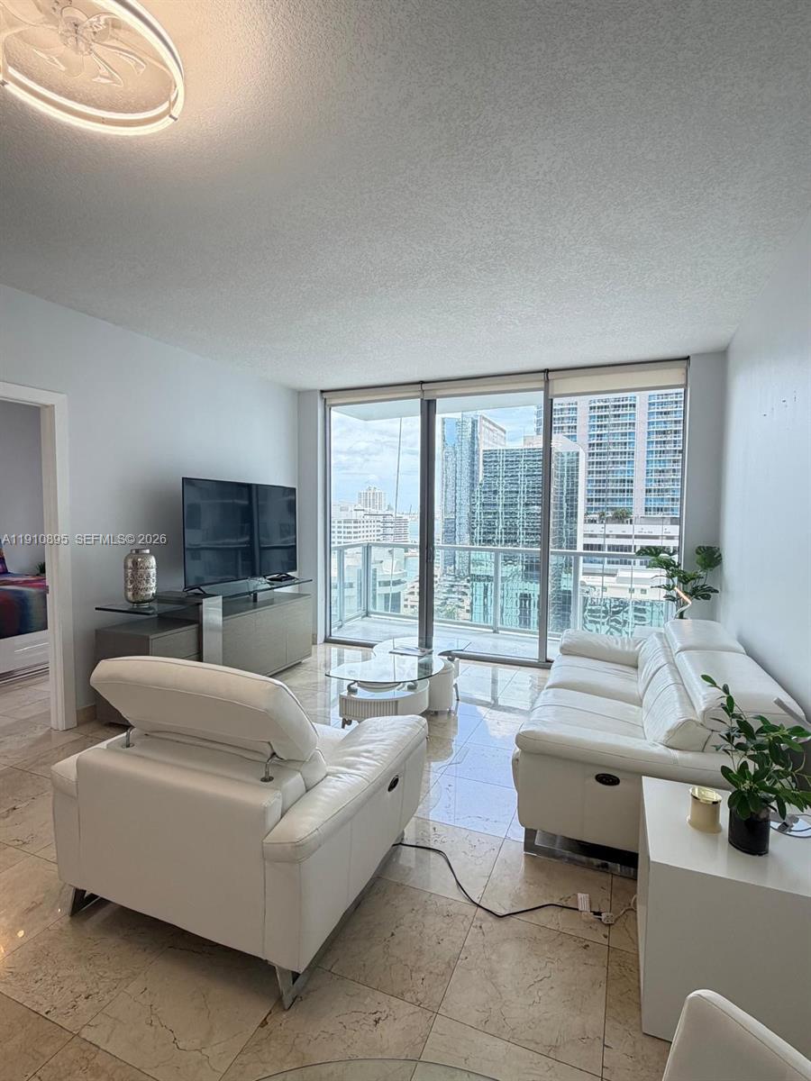 Unbeatable value in Brickell! This 731 sq ft, 1-bedroom, 1-bath condo at 1050 Brickell is offered with a longterm tenant through March 2026, with option to renew. Features include in-unit washer/dryer, high ceilings, expansive floor-to-ceiling doors, and a bright, open layout that maximizes space and style at an exceptional price per square foot.
Resortstyle living with premium amenities: pool, fitness center, sauna, 24-hour concierge, and valet parking. Walk to Brightline, Metrorail, Brickell City Centre, and Mary Brickell Village, with causal and upscale dining and shopping right at your doorstep.
Unit is ideal for investors or end-users seeking instant value and equity in a prime location. Great investment opportunitie awaits you in your new home  —schedule your private showing today!