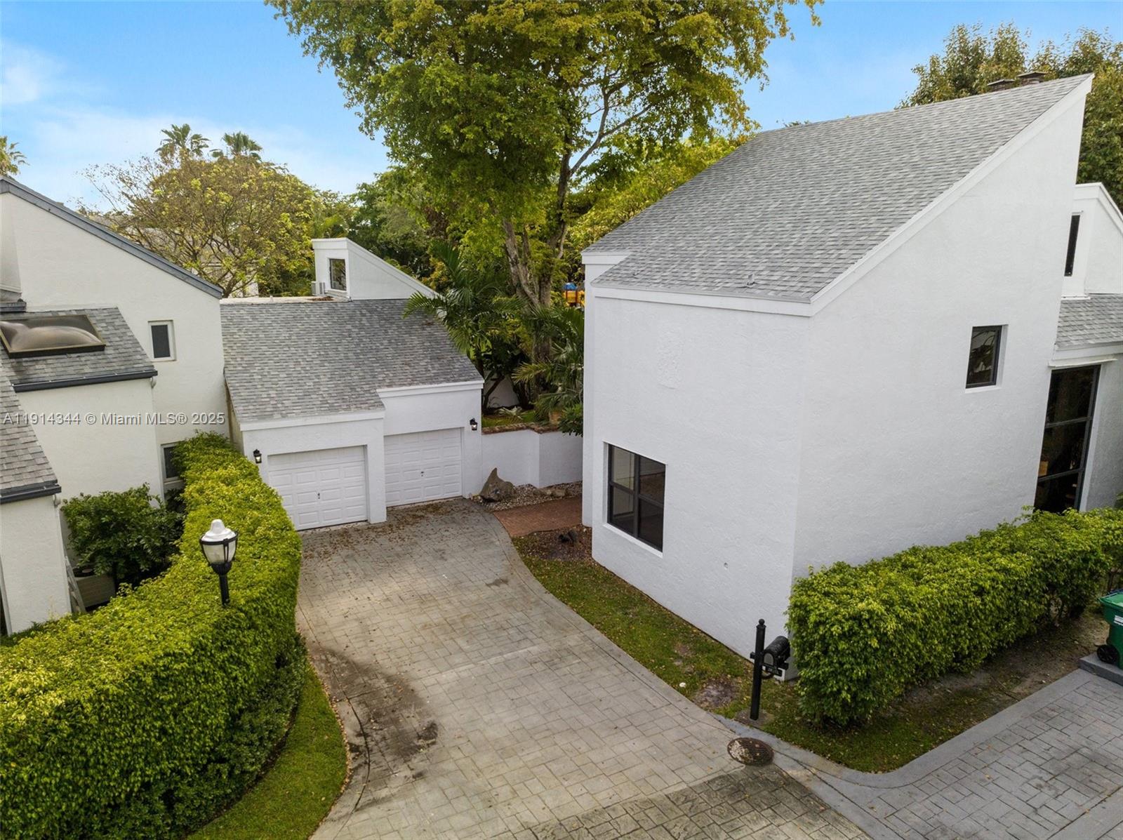 Welcome to this exquisite Cul-De-Sac property in the gated Chateaux Estates, N. Miami Beach. It offers 3 beds, 3.5 baths in the main house, with a separate guest house featuring 1 bed, 1 bath. The main home includes a master suite with his and hers bathrooms, loft-style bedrooms with private baths, and spacious living areas. A stunning dining room with a view and a chef's dream kitchen with top-notch finishes are highlights. 2020/21 roofs, high end hurricane windows & Doors, and a beautiful backyard with a fairy tale patio. The guest house has an enclosed 2-car garage. The home accommodates an additional 7 parking spaces. The location is ideal, near amenities like the pool, playground, Tennis/Basketball/Pickleball courts, gym, dog park, and more. Don't miss this exclusive opportunity.