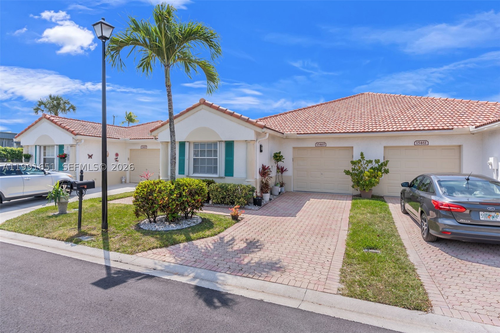 LOOKING TO LIVE AND ENJOY A FULLY PROFESSIONALLY UPDATED THREE BEDROOM HOME IN THE HEART OF DELRAY BEACH? YOU FOUND IT! THIS AMAZING HAVEN HAS NEWER ROOF (2021), A/C AND LOCATED ON A QUIET END STREET WITH GORGEOUS LAKE VIEWS. BRAND NEW STATE OF THE ART KITCHEN HAS CUSTOM CABINTERY, STAINLESS APPLIANCE PACKAGE, WASHER/DRYER, AND EVEN A WINE BAR CENTER! HUGE OPEN FLOORPLAN, NEUTRAL TILE THROUGHOUT AND A PRIMARY BATHROOM WITH A SPA DESIGN! CUSTOM CLOSETS THROUGHOUT. LARGE ONE CAR GARAGE WITH ADDITIONAL STORAGE/WORKSPACE. CUSTOM LIGHTING THROUGHOUT. HUGE ENCLOSED PATIO THAT ALSO HAS A PAVERED EXTENSION PERFECT FOR GRILLING AND SUNSET VIEWS. UPSCALE RESORT COMMUNITY FEATURES CLUBHOUSE, TWO POOLS, BOCCI, PICKLEBALL, TENNIS, SHOWS, ENTERTAINMENT AND MUCH MORE! ONLY MINUTES TO DELRAY MARKETPLACE, DOWNTOWN ATLANTIC AVENUE AND THE BEST BEACHES! LOVELY WALKING PATHS, FITNESS CENTER AND A VARIETY OF CLUBS AND CLASSES. MILLION DOLLAR CUSTOM DESIGNER HOME JUST MOVE IN READY!