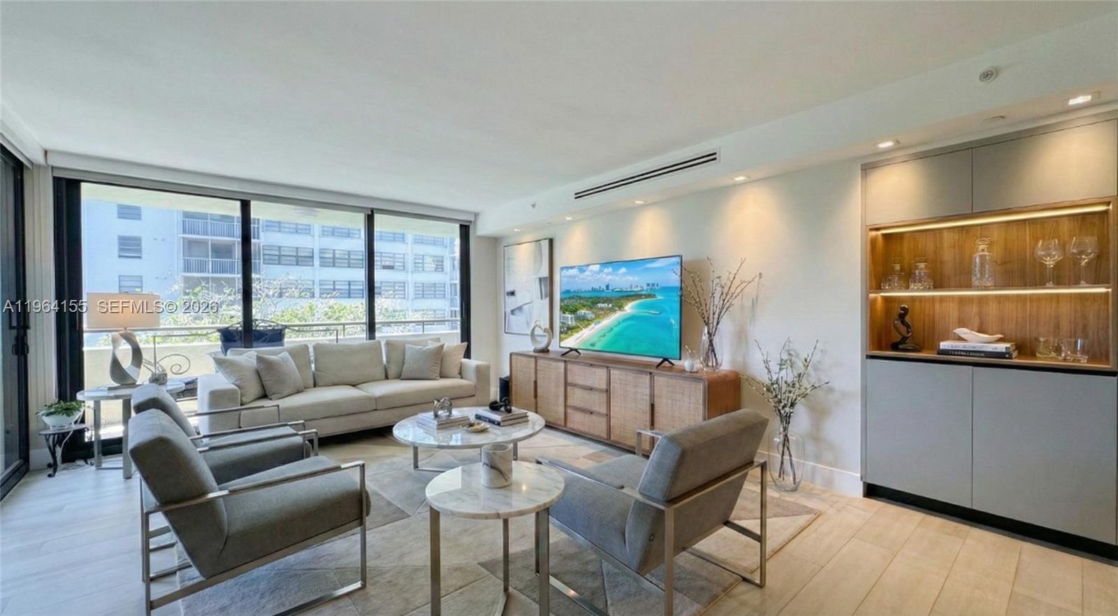 BEAUTIFUL FULLY REMODELED CORNER UNIT just a short walk to the beach, featuring two assigned garage parking spaces, a rare benefit in the building. this 2 bedroom / 2 bathroom spacious primary suite with walk-in closet and large master bath, an additional separate room ideal for an office or second bedroom flexible space, modern kitchen cabinets with granite countertops, large open balcony and hurricane shutters. the building offers great amenities including doorman service, 24-hour security, party room, exercise room, pool, spa, bbq area, beautiful lobby, covered garage, and extra storage room conveniently located right outside the front door. Enjoy the unique lifestyle that Key Biscayne has to offer.