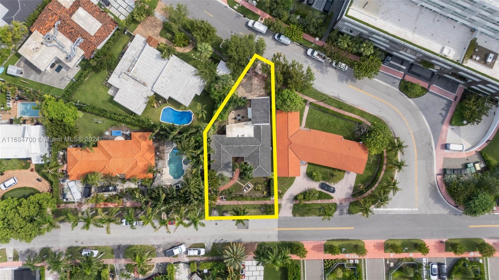 First time on the market. Expansive open concept two story home in the family friendly Nautilus neighborhood. This 4-bedroom residence offers a unique two convenient street entrances: the main one on W 47 Ct and a back entrance on W 48th St. All new high impact windows, front and backyard with room for a pool. Parking accessible for 2 plus cars from back entrance. Great location. Just a few blocks from 6.5 acres waterfront park featuring kayak and paddle board rental, dog park and more. Perfect opportunity for a renovation or build your own dream home. Must see, won't last.