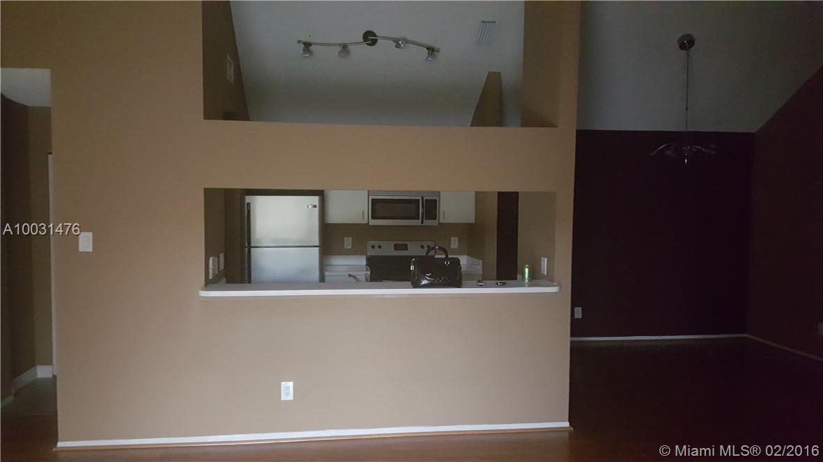 BEAUTIFUL APARTMENT IN HAMMOCKS AREA, SPACIOUS 3 BEDROOMS AND 2 BATHROOMS WITH LAMINAE FLOORS THROUGHOUT LIVING ARES AND CARPET IN THE BEDROOMS. FORMAL DINING ROOM, LIVING ROOM AND OPEN KITCHEN PLUS FULL SIZE. THE UNIT HAVE THE WASHER & DRYER. BALCONY WITH STORAGE. DON'T MISS THIS GREAT OPPORTUNITY.