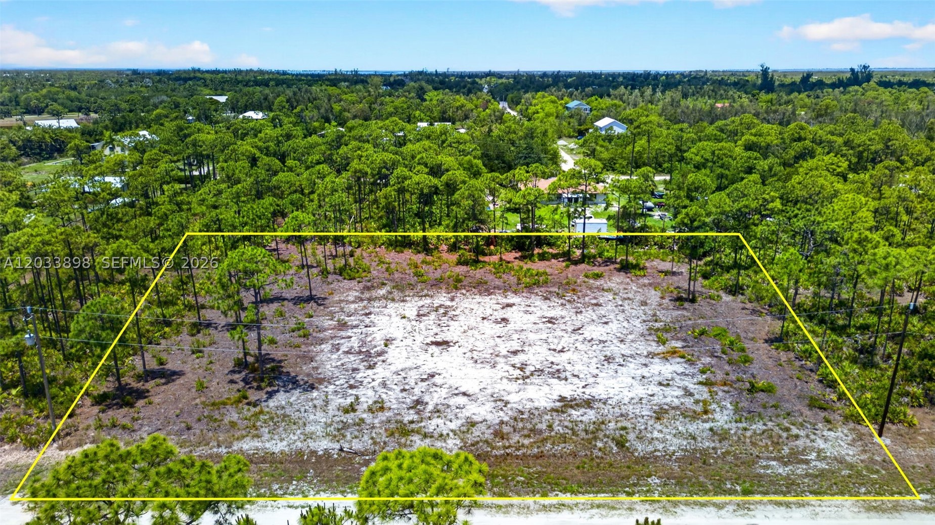 Rare Double-Lot Oasis! Cleared 1-Acre Parcel in Desirable Bokeelia – Ready for Your Dream Island Home! Escape to the tranquil paradise of Pine Island and build your ultimate retreat on this massive 1-acre cleared lot. While most standard parcels in the peaceful Kreamer’s Avocado subdivision are just a half-acre, this rare property offers double the size, giving you an incredible whole acre of pure potential. The grueling and expensive site preparation is already done for you. The lot has been meticulously cleared, and stumps have been completely removed, saving you thousands of dollars in upfront excavation costs, heavy machinery rentals, and months of waiting on contractors. It is a clean slate, 100% ready for your architectural blueprints. Situated on the highly sought-after north end of Pine Island in Bokeelia, this location perfectly balances secluded "Old Florida" charm with convenient modern amenities. Enjoy a relaxed, golf-cart-friendly island lifestyle surrounded by lush palm nurseries, tropical fruit groves, and vibrant local art culture. You are just minutes away from world-class tarpon fishing, multiple local marinas, public boat ramps, local boutiques and stunning waterfront dining landmarks like the historic Tarpon Lodge. When you need a taste of the city, Cape Coral is just a short, scenic 20-minute drive away. Electricity and water available in the immediate area. No HOA and the property is NOT in a flood zone!