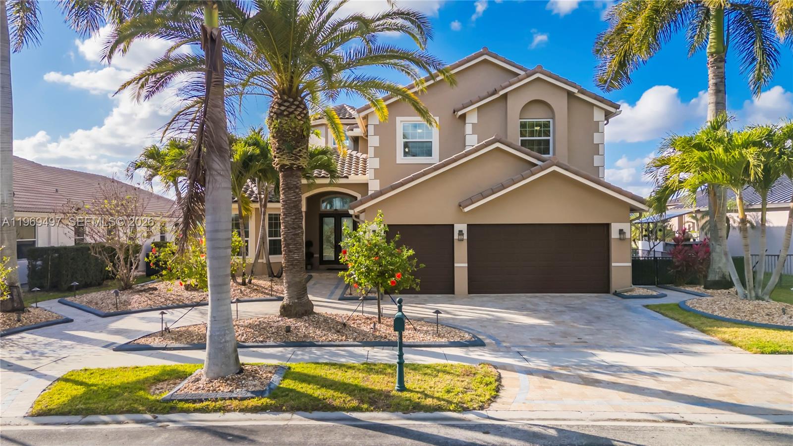 Lakefront pool home in the gated community of Sunset Lakes with nearly $500K in upgrades, including a NEW ROOF, full IMPACT WINDOWS & DOORS, and a high efficiency Lennox 28 SEER HVAC system. This upgraded property offers 4 bedrooms plus a large loft (perfect 5th bedroom), 4 full bathrooms, and soaring ceilings that fill the home with natural light.The remodeled open concept kitchen was designed for entertaining, featuring quartz countertops, ceiling height cabinetry with pull outs, a large island, and LG Signature stainless steel appliances including double wall ovens and convection microwave. A spacious walk in butler’s pantry adds quartz counters, additional cabinetry.The primary suite features custom closets and a private balcony overlooking the lake. Step outside to a private backyard retreat with a pool, travertine surfaces, a screened patio, and a 20 x 20 pergola with motorized sun & bug screens, creating the perfect outdoor entertaining space.Additional upgrades include a remodeled primary bathroom, renovated laundry room with quartz counters, custom made blinds, finished garage with coated floors and storage racks, EV charger outlet, whole house gutters, smart switches, & lake fed irrigation. Sunset Lakes offers resort style amenities including clubhouse, fitness center, tennis, pickleball, basketball courts, and 24/7 security. HOA includes cable and internet. Contact me today to learn more about this assumable loan opportunity at a 2.25% interest rate.