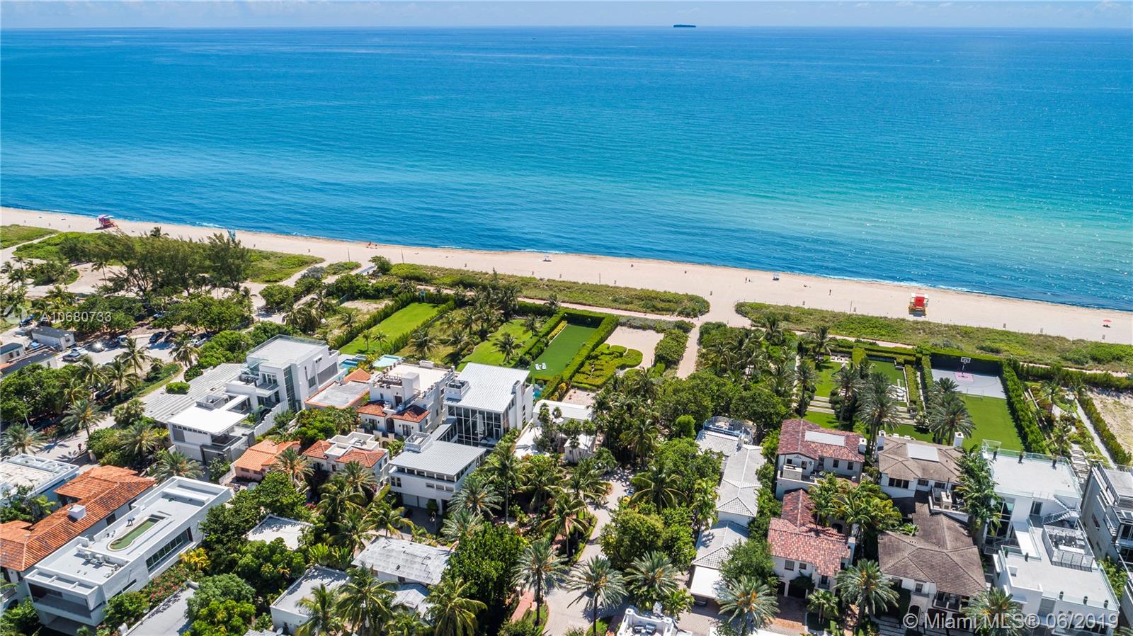 First time on the market in 48 years. Rare opportunity to own a direct oceanfront property in an exclusive guard gated community. This well-maintained 2 story 1930’s Colonial style residence is located on an expansive 16,000 sf lot and boasts 4 beds, 4 baths, 2 car garage and private terrace entrance with one of a kind stunning direct oceanfront view of the beach and Atlantic Ocean.  Endless possibilities for the buyer seeking the ultimate beach retreat. Gated private lush garden complete with fruit trees. Community is located on Collins Ave between 77th and 79th Street and is comprised of 12 oceanfront residences with direct pedestrian access to the beach, park and beachside boardwalk. Minutes from famed Bal Harbour shops, restaurants and South Beach.
