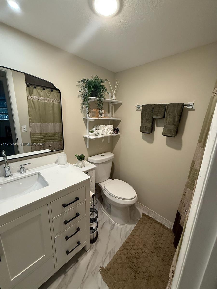 KINGS POINT BURGUNDY COND - Residential