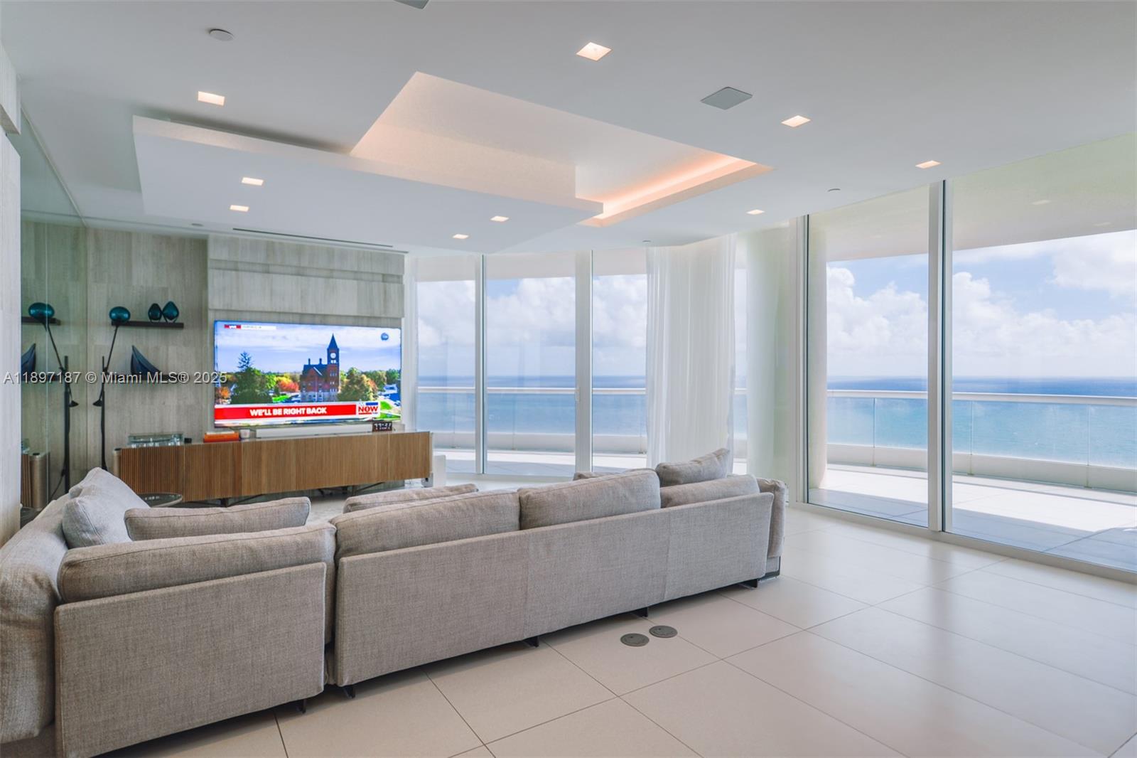 Live the essence of refined coastal luxury in this exquisite 4-bedroom residence with a maid’s quarter and 6.5 bathrooms, masterfully reimagined to perfection. fully remodeled and upgraded. Every corner reflects impeccable taste and timeless elegance, blending contemporary design with serene seaside tranquility.
A grand open-concept living space flows seamlessly into a chef’s kitchen, ideal for both intimate gatherings and elegant entertaining. The expansive master suite is a private retreat of pure serenity, featuring a spa-inspired bathroom, bespoke finishes, and a terrace overlooking the ocean and bay.
Indulge in the exclusive privileges of resort-style living and intelligent smart-home technology that redefines modern comfort.