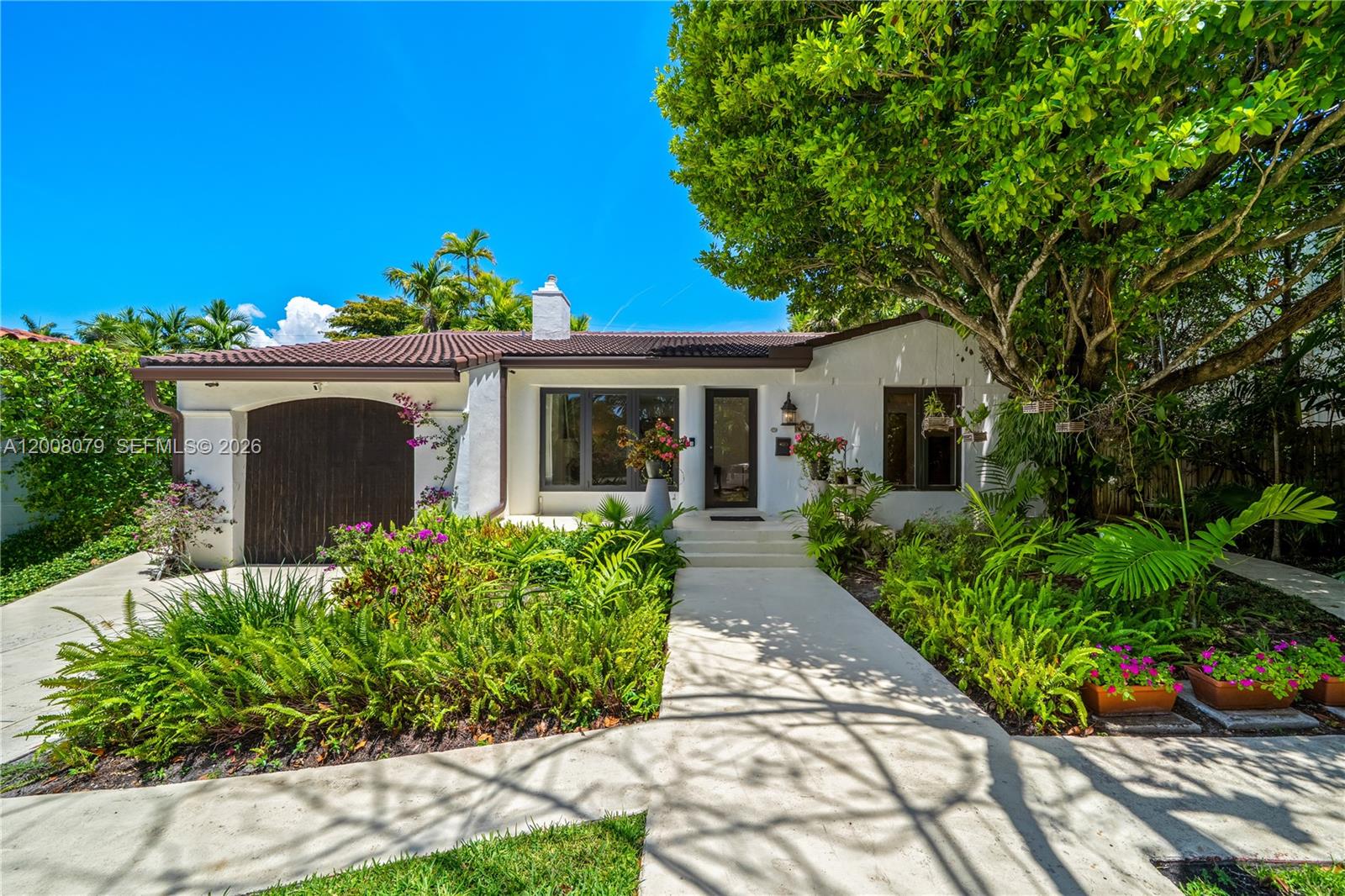 Nestled in one of Miami Beach's most coveted neighborhoods, this charming one-story Lakeview residence offers effortless living at its finest. Full of charm and brimming with potential, the home features 3 bedrooms, 2 bathrooms, an eat-in gas kitchen, and a seamless, light-filled floor plan designed for comfort and ease.
Step outside to a lushly landscaped, oversized lot where mature tropical gardens frame a private backyard oasis — complete with a sparkling pool, sun-drenched patio, and a covered al fresco dining area ideal for entertaining or unwinding in total privacy. Brand new roof. Walking distance to Fisher Park. Minutes from Miami Beach's world-class beaches, houses of worship, top-rated schools, major highways, and Miami International Airport.
A rare opportunity to own in Lakeview — where quiet, tree-lined streets meet the best of the Miami Beach lifestyle.