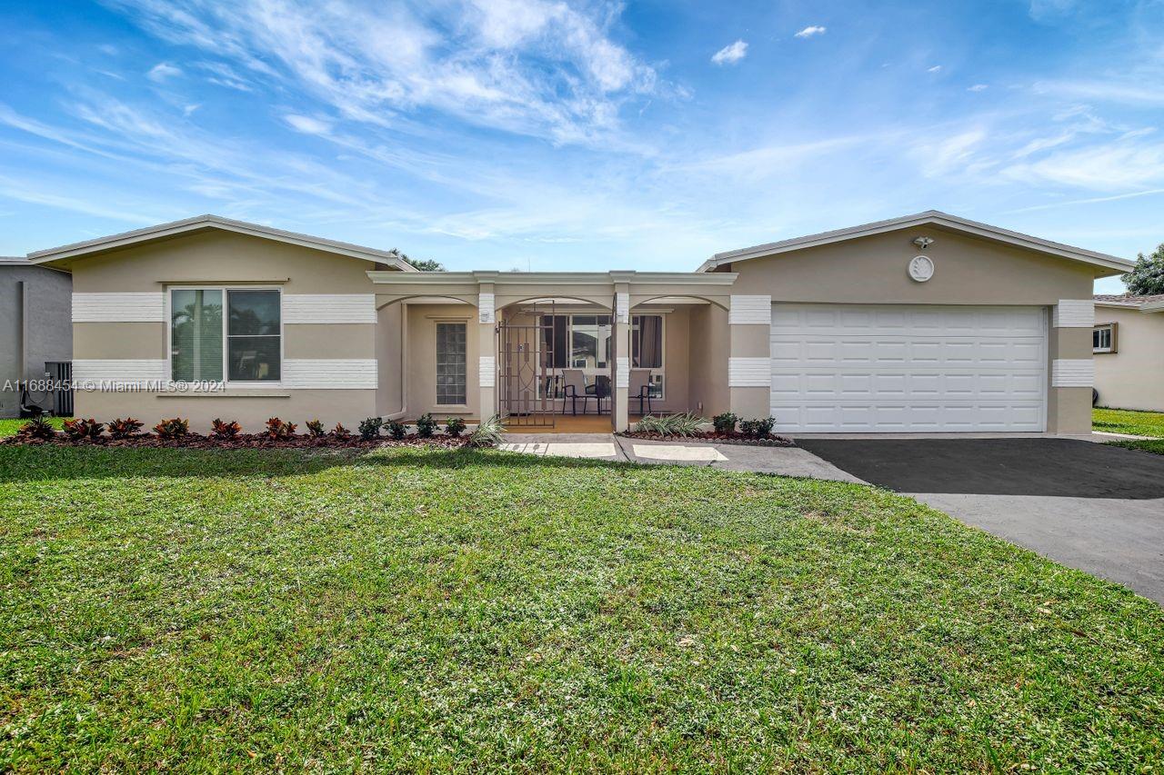 Stunning single-family, pool home in the heart of Plantation's Nob Hill Estates. Upgrades galore: new roof, 2024, all impact windows and doors with transferable warranty, 2022, new water heater, 2024 and freshly painted exterior, 2024. AC 2016 with new coils, 2021. This great family home boasts 4 bedrooms with a 3-way split floorplan, 2-baths, open kitchen with pass-through to the pool area. Large, fenced backyard and pool/patio is ideal for bbqs, parties and more! Close to A-rated schools, major roadways, Sawgrass Mills, Ikea and great parks and nature trails. Less than 1 mile to A-rated Central Park Elementary School.