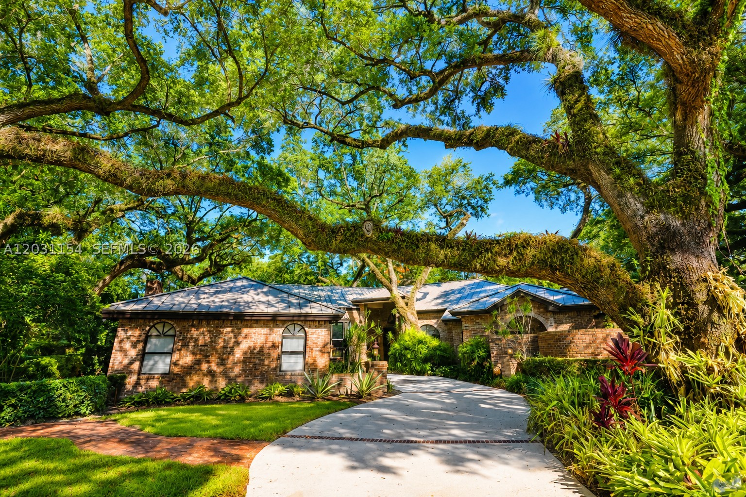 Welcome to 5440 Shady Oak Lane, a truly special estate located within the gated community of Shady Ridge Estates, comprised of only 17 homes. Offering 4404 SF of living space, this custom residence combines space, privacy, and comfort. Inside, you'll find hardwood floors, soaring ceilings, a private office, wine cellar, fireplace, generous living areas, and an oversized kitchen.
The screened pool and spa area serves as the centerpiece of the outdoor living space and features a covered BBQ area with a dedicated pool bath, making it ideal for gatherings with family and friends. Expansive green spaces, amazing landscaping, and a charming treehouse create a backyard environment rarely found in South Florida.
The property includes the main homesite with 21,874 SF plus an adjacent separately lot of 9,839 SF, for a combined total of 31,713 SF of land. The additional parcel offers endless possibilities, whether for a children's playground, sports court, garden, entertaining area, or simply additional privacy and open space.
Residents enjoy a strong sense of community while being conveniently located near major highways, Fort Lauderdale Hollywood International Airport, the Seminole Hard Rock Hotel & Casino, shopping, dining, and close to more than 20 houses of worship.
Sale includes adjacent  lot.