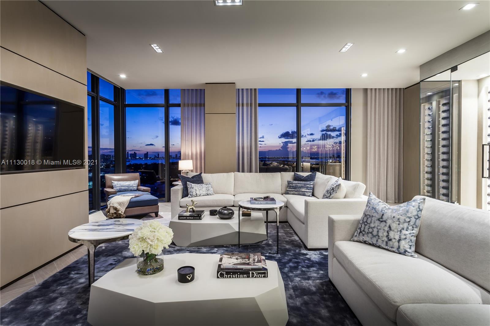 Exquisitely designed penthouse will dazzle the most discerning of buyers. Boasting fine custom furnishings, a back-lit bar & wine room, walls of glass, spacious terraces and an expansive rooftop terrace with plunge pool and built-in seating. Dazzling vistas of Atlantic Ocean, South Beach and city skyline. Amenities include state-of-the-art spa/fitness center; 2 pools, beach, fine & casual dining, including the renowned Mr. Chow, tennis & basketball courts; and concierge service.