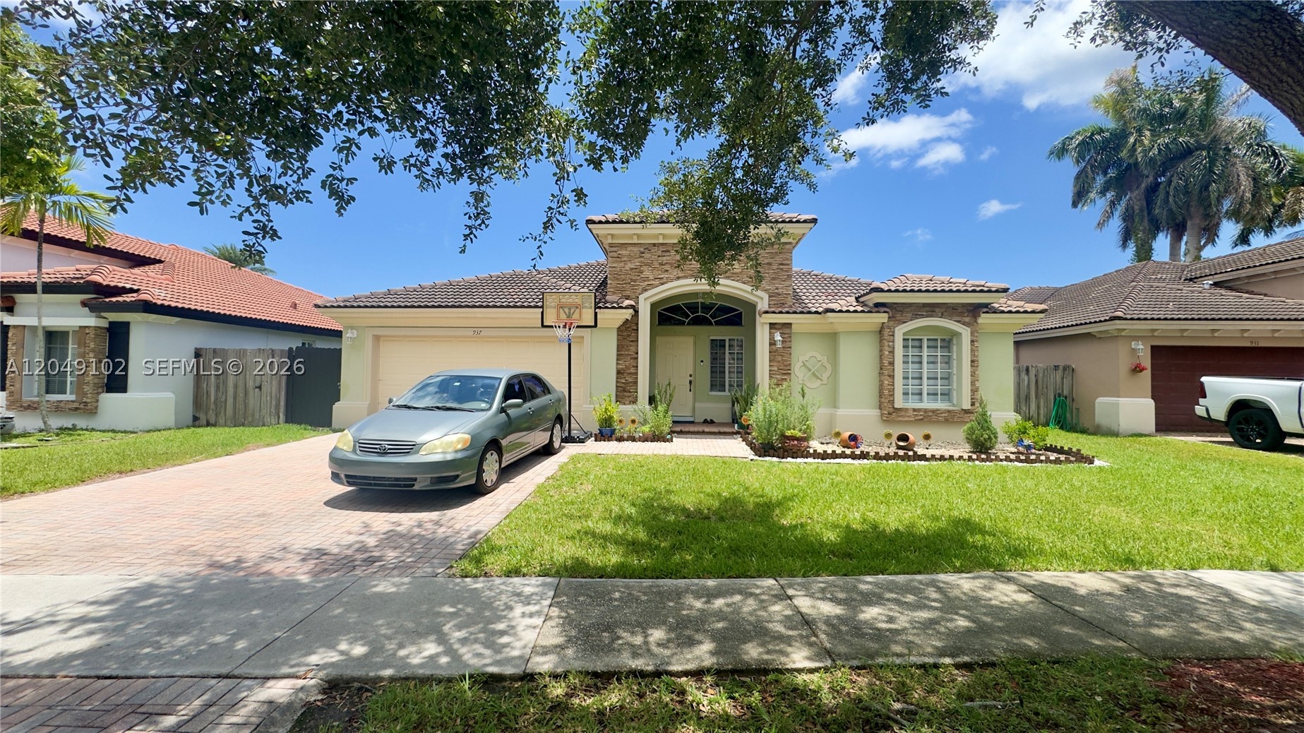 Discover this beautifully maintained 1-story single-family home offering 4 bedrooms, 3 bathrooms, and a spacious 2-car garage in a desirable Homestead community. The remodeled kitchen features stainless steel appliances, modern finishes, and plenty of storage. Tile flooring flows throughout the home, while a whole-home water filtration system adds everyday comfort and value. Enjoy community amenities including a pool and clubhouse. Conveniently located just minutes from Baptist Homestead Hospital, shopping centers, restaurants, parks, schools, and easy access to the Florida Turnpike, this move-in-ready home is the perfect combination of comfort, style, and location.