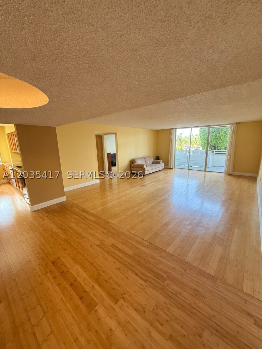 Massive 1,666 sq. ft. Corner Unit in the Heart of Aventura/Williams Island Blvd area. This is one of the largest 2-bedroom layouts in the building, featuring a desirable split floor plan that maximizes privacy. Tastefully remodeled in 2018 with genuine bamboo flooring and freshly painted in 2026. 

Peace of mind included: features a BRAND NEW (2024) premium Bosch high-efficiency AC system, an upgrade rarely found in comparable listings. Kitchen equipped with stainless steel appliances. 

Located on the 2nd floor, offering quick stair access to bypass lobby waits, plus a large private deck area. Includes assigned parking and an additional storage closet. 

Building amenities include a heated pool, tennis courts, full gym, BBQ area, and relaxation pond. 

Unbeatable location: Steps from Fresh Market, Aventura Mall, Founders Park, and dining. Move-in ready.

This rare spacious opportunity won't last long. Schedule your private showing today!