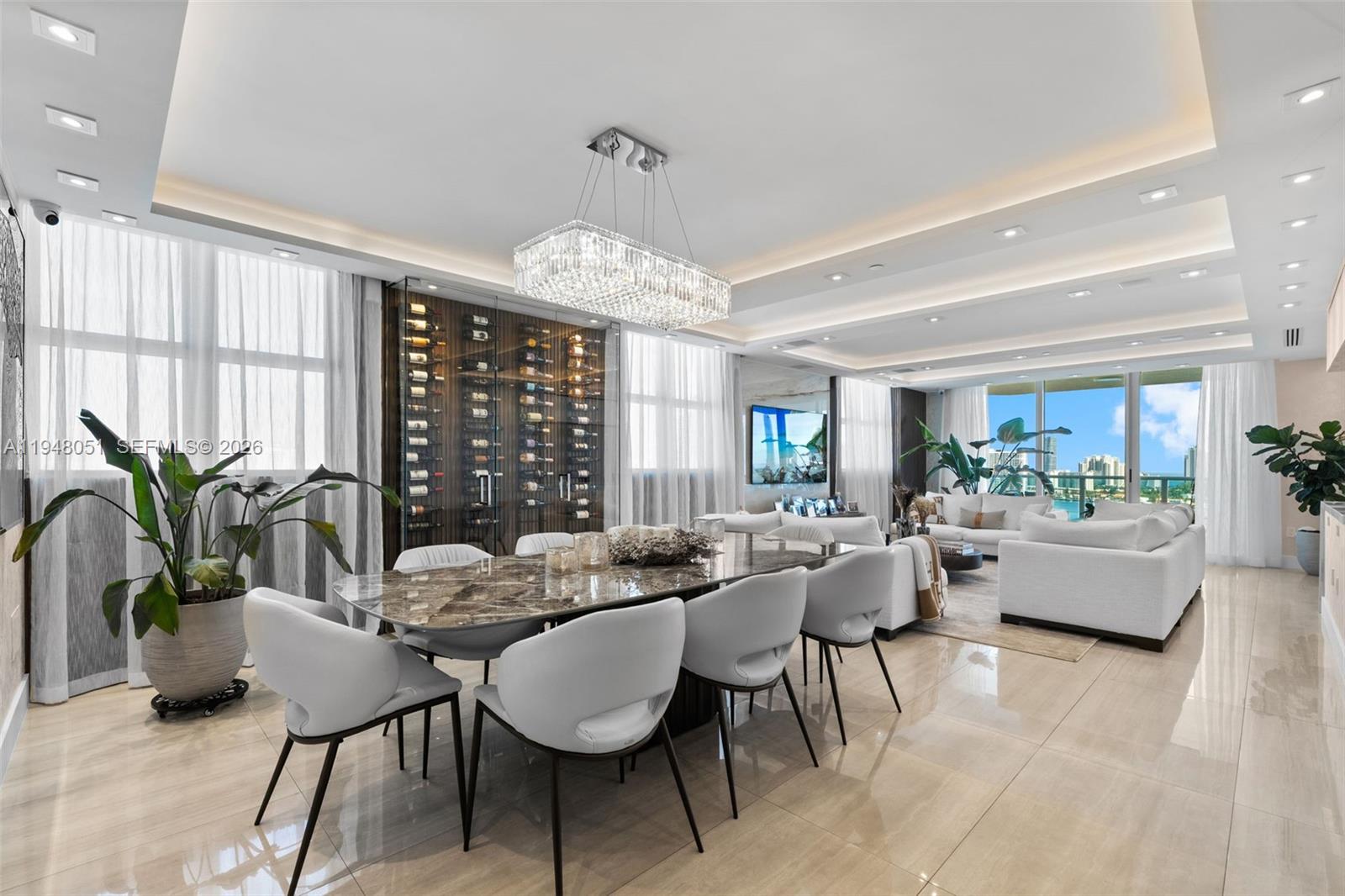 This meticulously renovated 4-bedroom + Media Room residence with 4.5 bathrooms has over 3,533 sq. ft. of living space. (3) Parking Spaces. Unparalleled views and exquisite living. This home was recently upgraded and is a rare gem with a custom floor plan and over $1.2 million in renovations. The state-of-the-art kitchen is a chef's dream, featuring an oversized island and built-in appliances, ideal for entertaining and everyday cooking. Seamless living is ensured by a comprehensive home automation system that controls audio, video, lighting, HVAC, and window treatments, enhancing comfort and adapting effortlessly to your preferences. Sophistication extends to custom closets with integrated lighting. Every detail in this exceptional property is designed to combine functionality with elegance, enhancing the overall living experience.