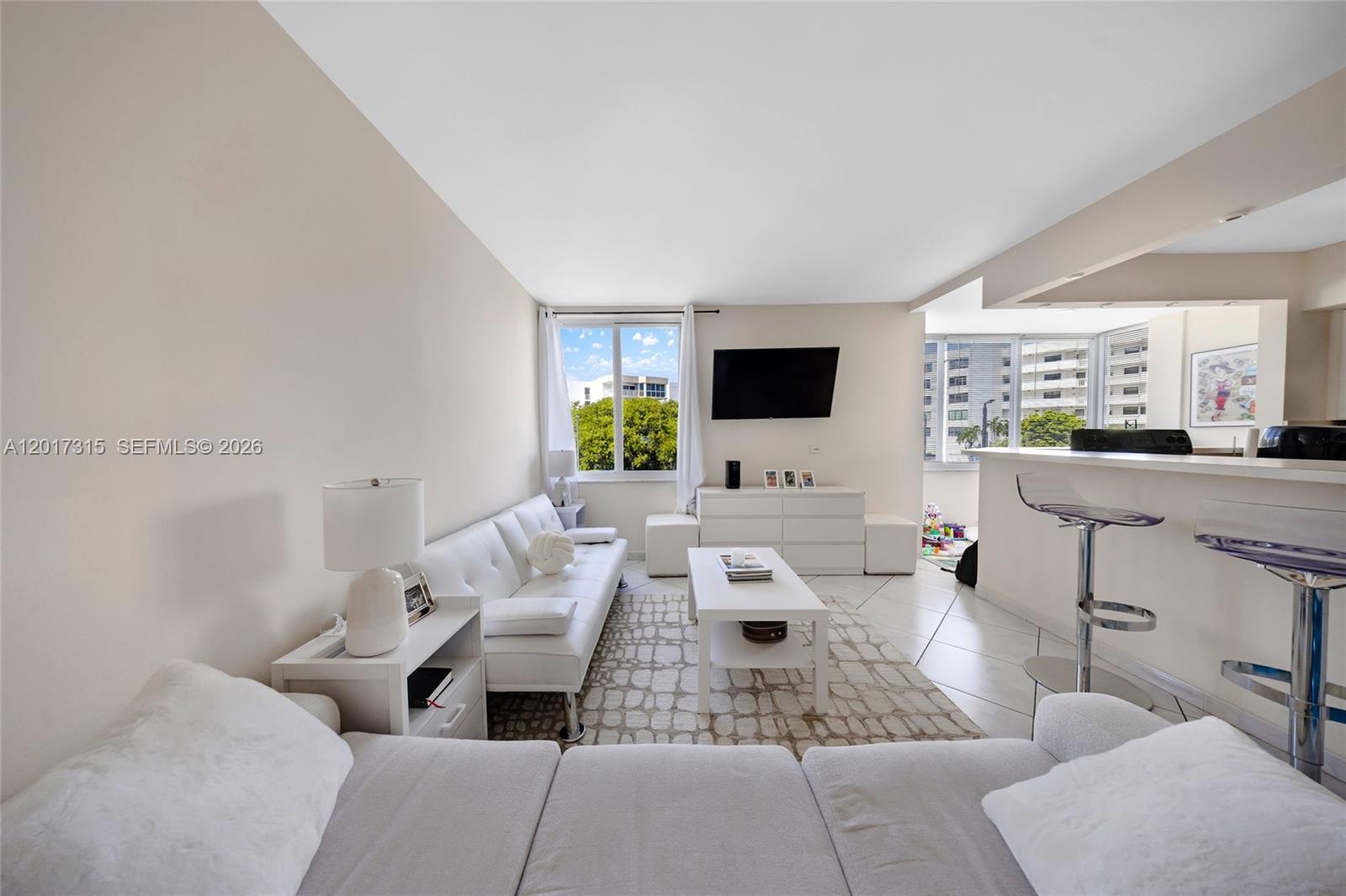 LOCATION, LOCATION! Ideal Investors. Don't miss out on this opportunity to own a property just one block from Collins Avenue and the beach. Excellent schools in the area and NO RENTAL RESTRICTIONS (long term only), currently rented to an excellent tenant paying $2000/month with lease ending August 2026. Building has two special assessments for various upgrades including concrete repairs, exterior painting, new impact windows, elevator modernization, interior hallway painting, hallway carpeting, pool, parking lot, etc. One is $135.39/ month, ending 11/2032. The other special assessment is $118.36/ month, ending February 2039. HOA $742, total x month $996