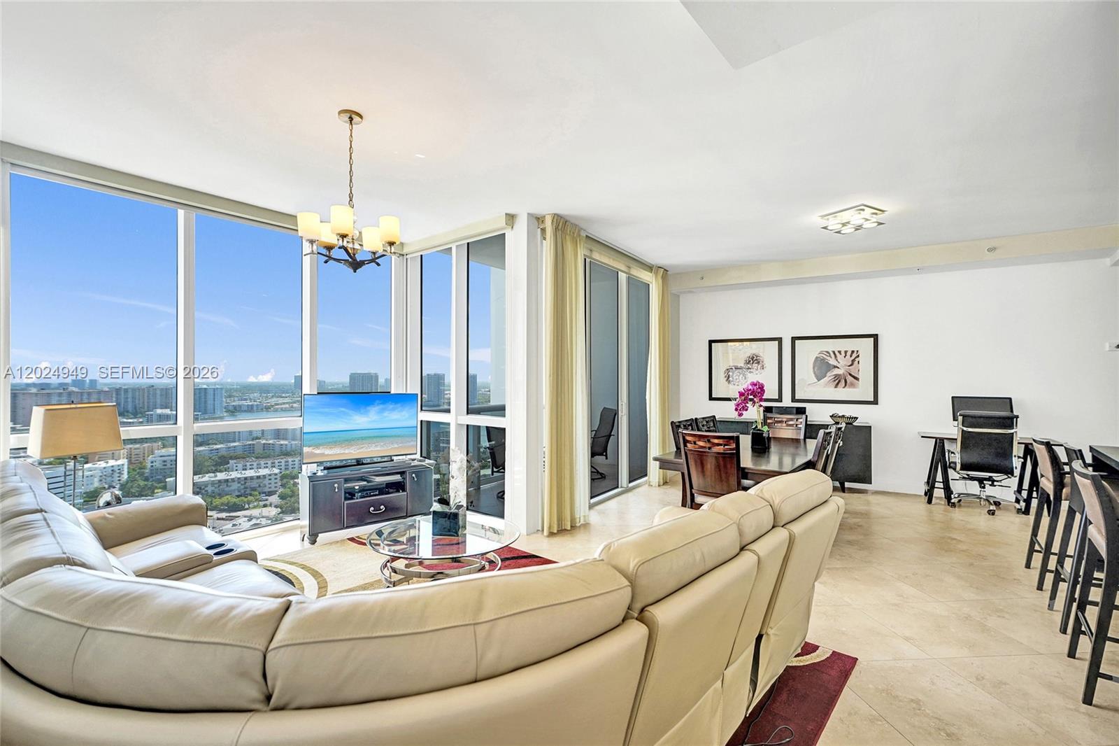 Turn-key luxury residence at Trump Royale Unit 3707 offering breathtaking Intracoastal views from a high floor in the heart of Sunny Isles Beach. This beautifully furnished condo is move-in ready and features floor-to-ceiling impact glass, expansive terraces, elegant finishes, a spacious open layout, and a gourmet kitchen with premium appliances. Enjoy a seamless blend of comfort, sophistication, and resort-style living in one of the area’s most desirable oceanfront buildings. Perfect for both end users and investors, this residence offers flexible rental terms allowing rentals 2 times per year with a minimum 6-month lease. Residents enjoy world-class amenities including private beach service, multiple pools, fitness center, spa, tennis courts, valet, concierge, and 24-hour security. Ideally located near fine dining, luxury shopping, Bal Harbour Shops, and Aventura Mall. Whether you are looking for a primary residence, vacation home, or investment property, Unit 3707 delivers exceptional value, luxury, and lifestyle. Easy to show and ready for immediate occupancy.