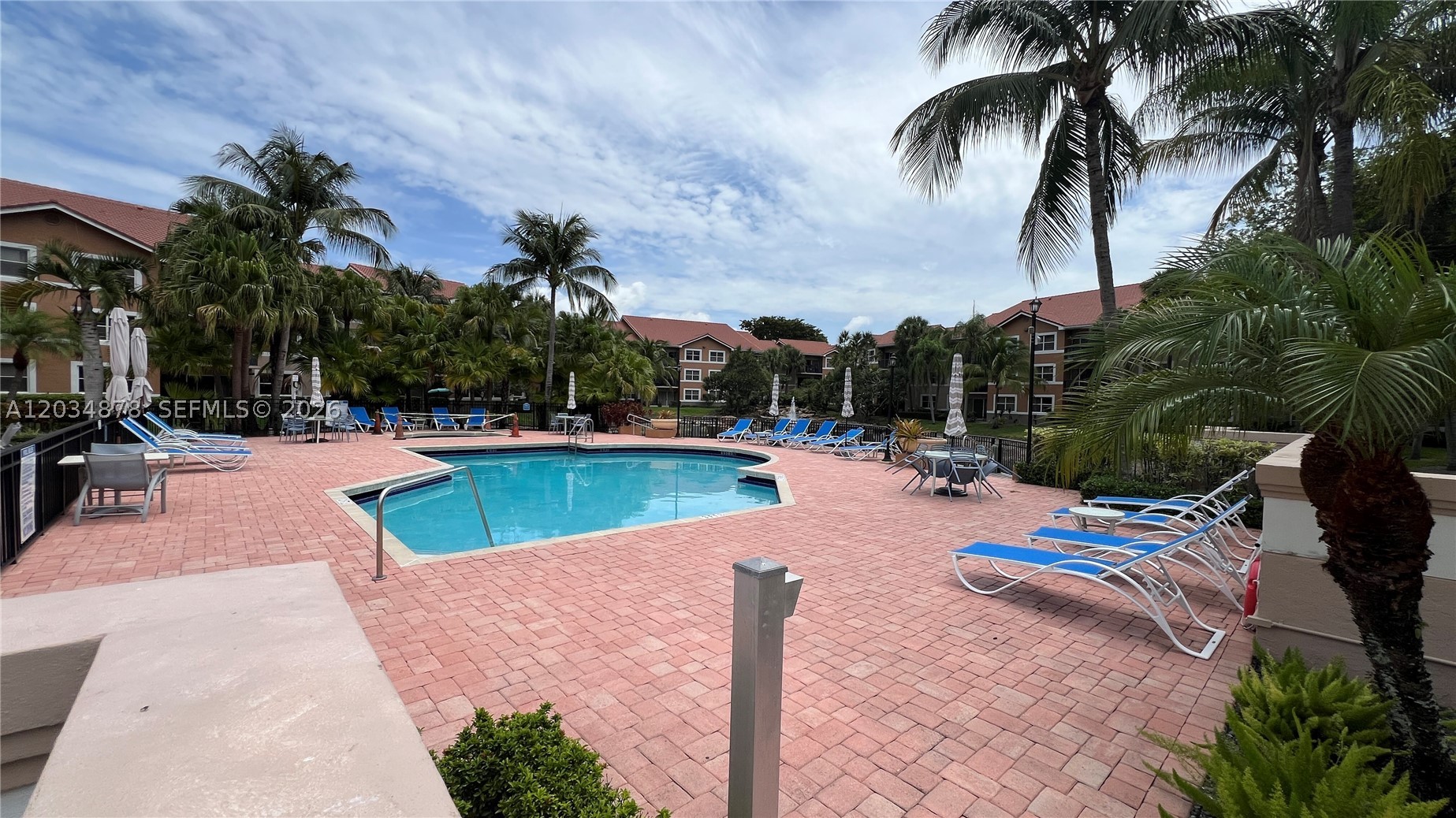 Beautifully renovated 2-bedroom, 2-bathroom first-floor condo in the highly sought-after gated community of Edgewater in Coral Springs. This move-in ready home features brand-new flooring, new A/C, new washer and dryer, updated vanities, and fresh paint throughout. The split-bedroom floor plan offers privacy and functionality, with spacious living areas filled with natural light. Enjoy resort-style amenities including a pool and spa, children's pool, playground, tennis courts, two-story fitness center, dog park, BBQ area, and clubhouse. Conveniently located near top-rated schools, shopping, dining, and major highways. Association approval required.