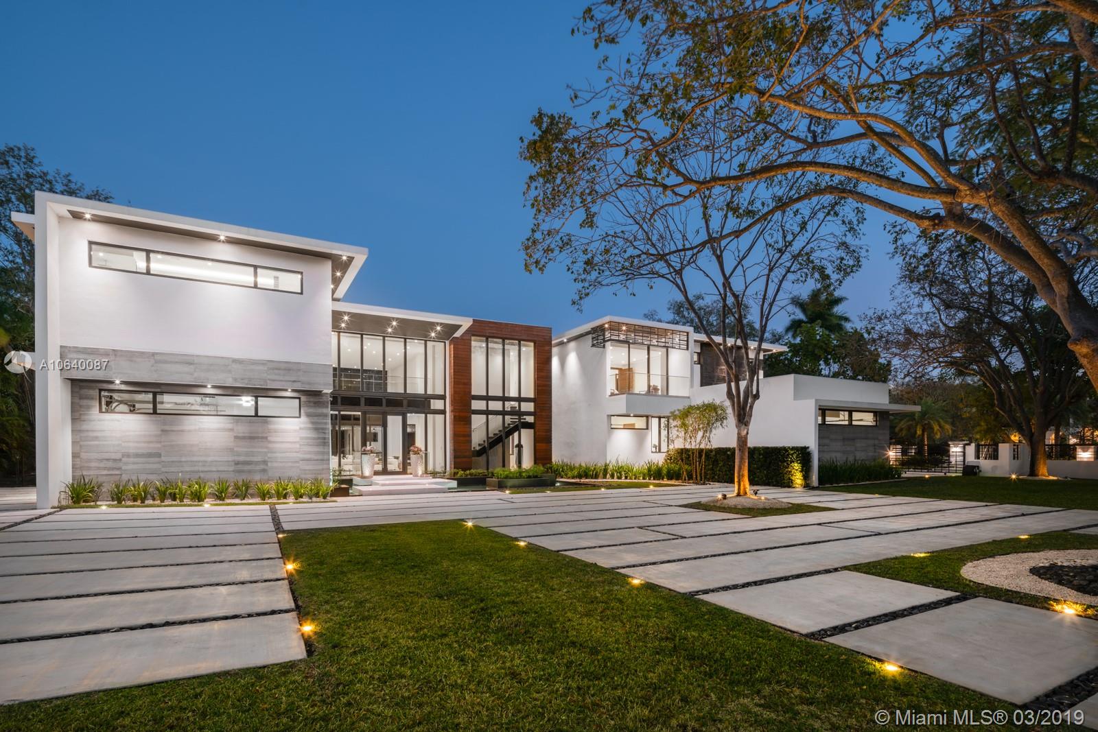 This stunning new construction estate is the perfect translation of luxury tropical modernism & the latest edition in the prestigious North Pinecrest. Ideal for a private retreat or a magical setting to entertain, this 8 SUITE BR, 10.5 baths,1.1 AC lot embodies an ultra-chic ingenious design that creates a unique oasis of world-class interiors & cutting-edge architecture. It's over 14,000 sf seamlessly blends w/the Tropical-Zen features such as resort style pool, stunning Ipe wood deck & unique checkers sundeck. All beautiful laid out to easily communicate with the spacious guest house, separate Clubroom & Gym. Surrounded by water features, separate barbecue area, cabana, large ext. terraces, marble floors, wine cellar, Italian doors & kitchn, Gated motor court, 4 CG, prewrd for smarthouse