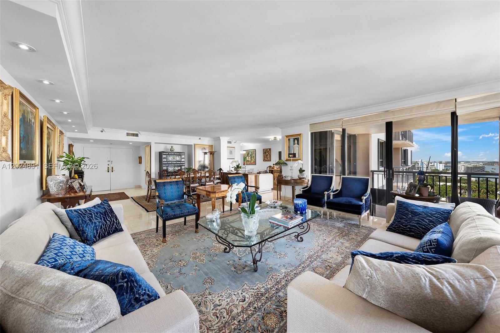 Experience luxury living at the prestigious Tiffany of Bal Harbour in this spacious 2-bedroom + den, 2.5-bath residence offering 2,018 SF of interior living space. Perched on the 15th floor, this exceptional apartment showcases breathtaking direct Bay and Ocean views from expansive balconies, perfect for entertaining and enjoying the coastal lifestyle.

The thoughtfully designed layout features oversized living areas filled with natural light, a generous primary suite, and a versatile den that can easily be converted into a 3rd bedroom. Ideally located just moments from the world-renowned Bal Harbour Shops, fine dining, and the boutiques and cafés of Surfside.