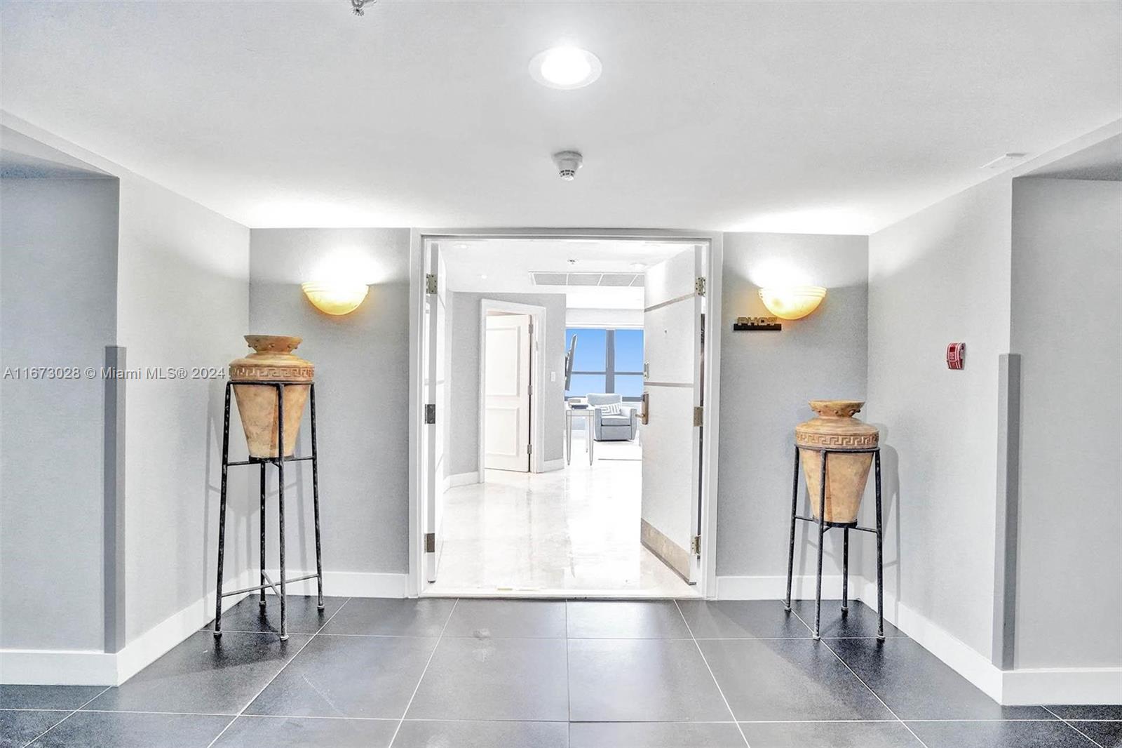 Step into this bright 3BD/3BA furnished penthouse with a large balcony offering stunning ocean, city, and bay views. At 1,860 SF (per owner), it boasts a spacious living/dining area and a granite kitchen. Natural light fills the unit through oversized impact windows/doors. Includes washer/dryer. Enjoy valet, concierge, maid service, gym, spa, restaurant, café, 2 pools, poolside bar, and beach service. Maintenance covers electricity, AC, Wi-Fi, hot water, and cable. Click the virtual tour link for a video.