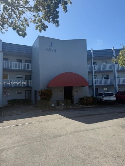 Welcome to 6570 Royal Palm Blvd #215J in Royal Park Gardens, Margate. This spacious 2-bedroom, 2-bath condo offers comfortable living in a well-maintained community. The unit features a bright open living and dining area, a functional kitchen with ample cabinet space, and a private screened balcony perfect for relaxing and enjoying the South Florida breeze. The primary bedroom includes a large closet and private bath, while the second bedroom is ideal for guests or a home office. Royal Park Gardens offers great amenities and a convenient location close to shopping, dining, parks, and major roadways. A fantastic opportunity for year-round living or a seasonal retreat in the heart of Margate.