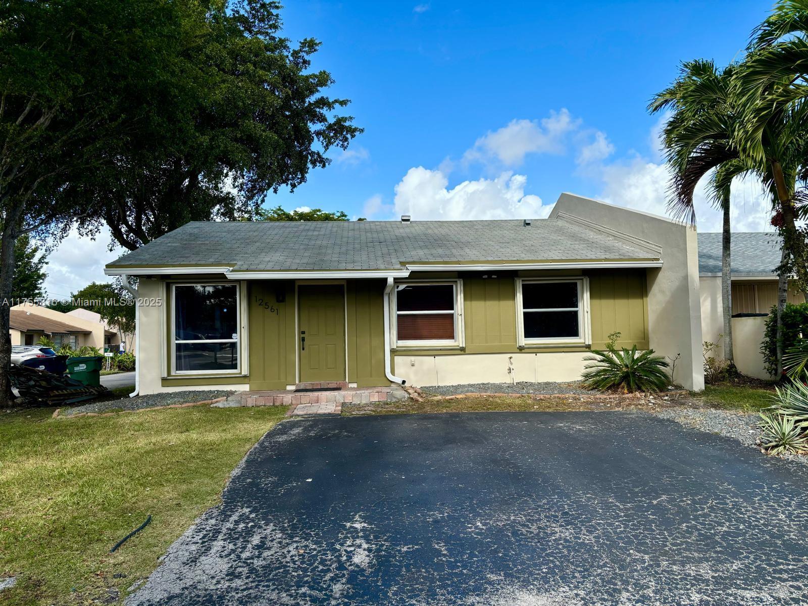 Beautiful 3 bedroom 2 bath corner townhome in the heart of Kendall (Lot & Block). Features new water resistant laminate flooring, modern light fixtures, updated lighting, and an open concept kitchen with elegant Dune and Venetian wall finishes. Equipped with accordion hurricane shutters for added convenience. Located in Devon-Aire, home to highly rated public schools. Low HOA of $399/year. This move-in ready home is priced to sell!