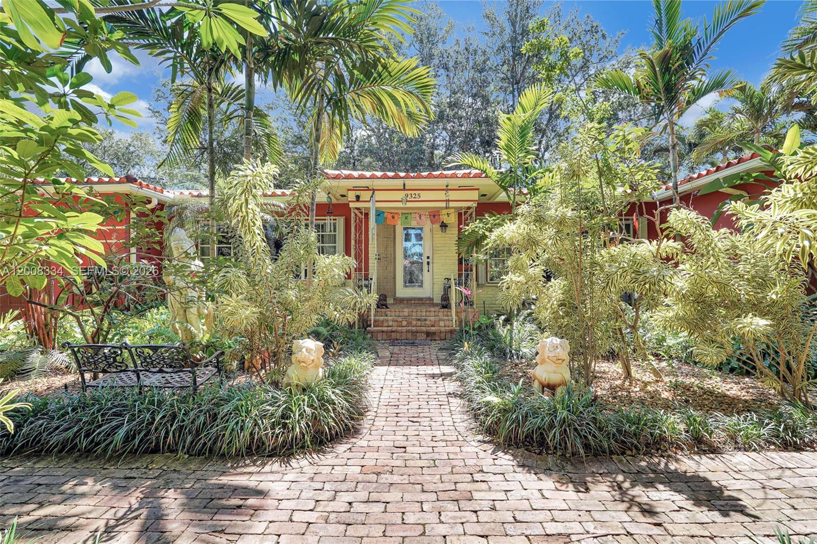 Discover the ultimate Mediterranean-inspired, tropical oasis-feel on the most coveted block of NE 5th Avenue in Miami Shores . This exceptional oversized 3-bedroom, 3-bathroom Living Room AND Family Room residence offers the ideal blend of elegance and comfort, with a thoughtful split-floor plan designed for both entertaining and everyday living. Gather in the expansive formal dining room, unwind in the sun-filled family room that opens directly to the pool deck, and enjoy a truly one-of-a-kind botanical setting filled with exotic plants and fruit trees. With a private well irrigation system, high-capacity climate control, Jacuzzi, CCTV Security System and an oversized heated pool, this estate delivers beauty, function, and year-round enjoyment. Don’t miss the opportunity to make this remarkable property yours.