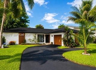 WATERFRONT HOME. OVERSIZED LOT. LOW $150 ANNUAL HOA. Close to Beaches, 2 Intl Airports, Downtown Davie, Cruise Ports, Hard Rock Stadium & less than 2 miles to Nova Southeastern Univ (NSU) and HCA Florida Univ Hospital. Spacious Home in LAKESHORE RANCHES is a Hidden Gem. Split-plan 3 Beds, 2 Baths. Kitchen & Family Rm separated from the Living Rm & Formal Dining Rm. Kitchen Whirlpool Energy Star appliances, Maytag Washer & Dryer, AND Plantation Shutters are included.NEW WATER HEATER OCT 2025 & AC 2023. Access your backyard 3 ways, Via Sliding doors from your Dining/Living Rm, from your Kitchen/Family Rm, AND from your PRIMARY SUITE. Relax in your Lanai, Enjoy Water Views, Easy-care landscaping, & DAILY Fishing, Kayaking, Swimming etc. AMAZING OPPORTUNITY. One or more photo(s) has been virtually staged.