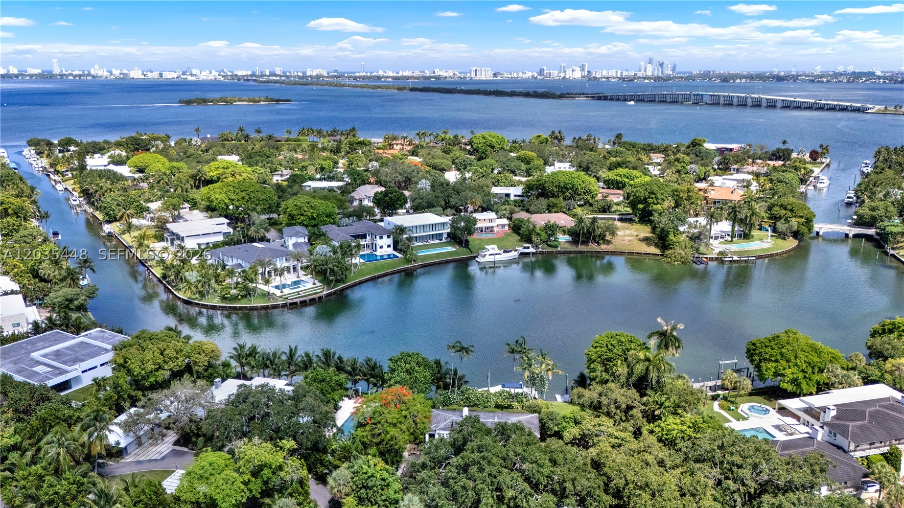 Experience refined living in Miami’s most prestigious gated community. Ideally positioned away from the perimeter wall for enhanced privacy and tranquility, this exceptional residence offers an exclusive opportunity to enjoy the coveted Bay Point lifestyle.

Set on an expansive lot, the home features a custom Keystone stone terrace—cool to the touch and perfect for year-round outdoor entertaining. The generous grounds provide a private retreat with abundant space for relaxation, recreation, and a resort-inspired outdoor setting.

Inside, soaring 18-foot ceilings create a dramatic sense of scale, while the open-concept layout is filled with natural light. Newly installed flooring throughout the residence adds a sophisticated contemporary touch, complementing the home's bright and inviting ambiance.

Residents will appreciate the unparalleled location, just minutes from Miami’s renowned Design District, Wynwood, Brickell, Downtown Miami, and the city’s world-famous beaches. Combining privacy, elegance, and convenience, this residence offers a rare opportunity to enjoy luxury living in one of Miami’s most sought-after neighborhoods.