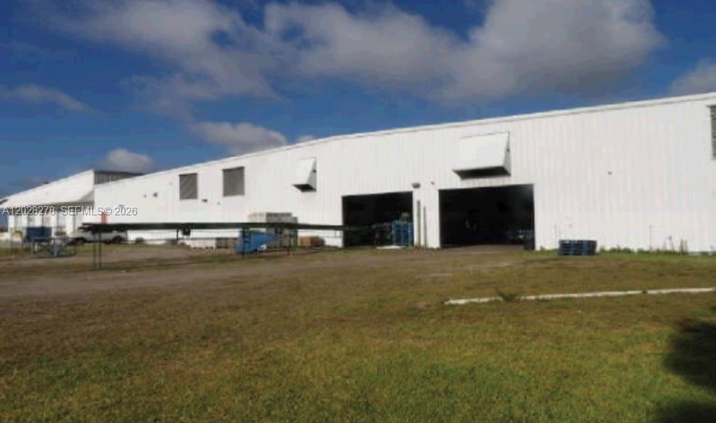 We are delighted to present a 33.14 Acre site perhaps ideal for cold-chain and logistics sectors. Currently used as Packing & Shipping Facility with refrigeration, designed and used for fresh produce. Total 3 folios. Flood Zone X. The Commercial Warehouse is 154,950 SF with concrete and steel construction, metal roof and metal siding. 21,600 SF is enclosed for walking/drive in coolers. The interior has 25' ceiling height and has 2,000 SF of covered/enclosed maintenance area; 6,000 SF covered work area; 18,000 SF of degreening rooms (now utilized for storage); 103,750 SF of packing line and box making area; floor offices and employee break rooms. A portion of the interior is dock height for delivery of products. The 3,600 SF professional office building is CBS construction. Other improvements on site:800 SF Metal Pole Barn, a 784 SF mobile home (2001) and retention pond. Fully fenced campus with 3 gated entries. One Megawatt Power is provided by Glades Electric. Telephone is provided by Embarq. Water & sewage disposal are provided by onsite well and septic systems. Immense storage capacity, cold storage feature, secured campus and rapid logistical turnaround. Facility is located within Hendry Co, Fl with frontage on Hwy 80, which provides direct line to I-75 (leading to Ft Myers and Tampa) and US-27 (leading to Miami or Orlando). In this region of Florida, the primary mode of transportation of goods is via truck. This area is serviced by most major carriers and freight lines.