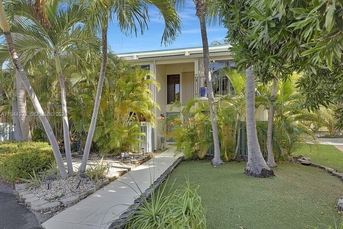ANCHOR IN PARADISE- 4 BEDROOM, 2 BATH IN ISLAMORADA- EXECUTIVE BAY CLUB, THIS IMMACULATE CONDO WILL CONVEY FULLY FURNISHED ALL COMPLETELY RENOVATED & UPDATED W/HURRICANE IMPACT WINDOWS, SLIDING GLASS DOORS, WASHER/DRYER DOWNSTAIRS.  PERFECT RETREAT W/SANDY BEACH, POOL, TENNIS COURTS, CLUBHOUSE FOR GATHERINGS, DOCKAGE AVAILABLE, BRAND NEW ONSITE MARINA, WALKING DISTANCE TO 'FOUNDER'S PARK' & FINE DINING!