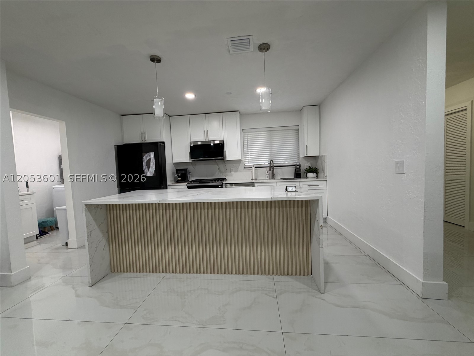 Exceptional investment opportunity in the heart of Plantation! This beautifully remodeled property features a 3-bedroom, 1-bath main residence plus two accessory units, offering excellent income-producing potential. The home has been updated with new bathroom, new kitchen, flooring, impact windows, natural gas service, a gas range, and a gas dryer. Step outside to enjoy a private swimming pool and a spacious fenced yard, perfect for entertaining or relaxing. Conveniently located near major highways, shopping, dining, parks, and schools. No HOA and no gated community, providing flexibility for both homeowners and investors. Whether you're looking to expand your investment portfolio or live in the main home while generating rental income from the additional units, this property is a must-see.