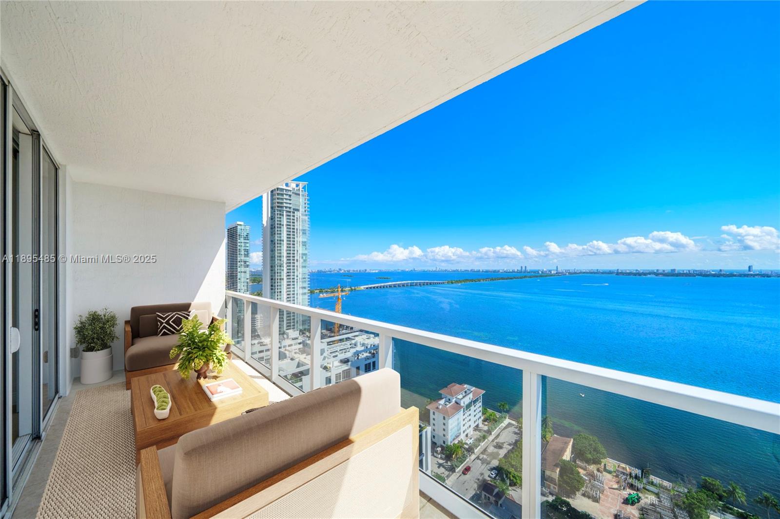 Bright and spacious southeast corner residence on the 31st floor of Bay House. The most desirable line in the building w/ breathtaking water views!! This 3-bed, 2.5-bath home features a modern European kitchen with pantry/laundry area, wraparound balcony off the living area plus a private balcony in the primary suite. The primary bath offers dual sinks, while two. bedrooms share a Jack-and-Jill bath with dual sinks and bathtub/shower. 2 parking spaces available. Bay House offers resort-style amenities: pool deck with cabanas, BBQ area, fitness center, and yoga studio. Perfectly situated in Edgewater with Starbucks and Whole Foods within walking distance, and an easy drive to the beach and airport. Minutes to Design District, Downtown Miami, and Brickell.